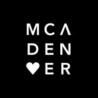 Black background with white text spelling 'MCA DENVER' vertically, with a heart symbol replacing the letter 'V'.