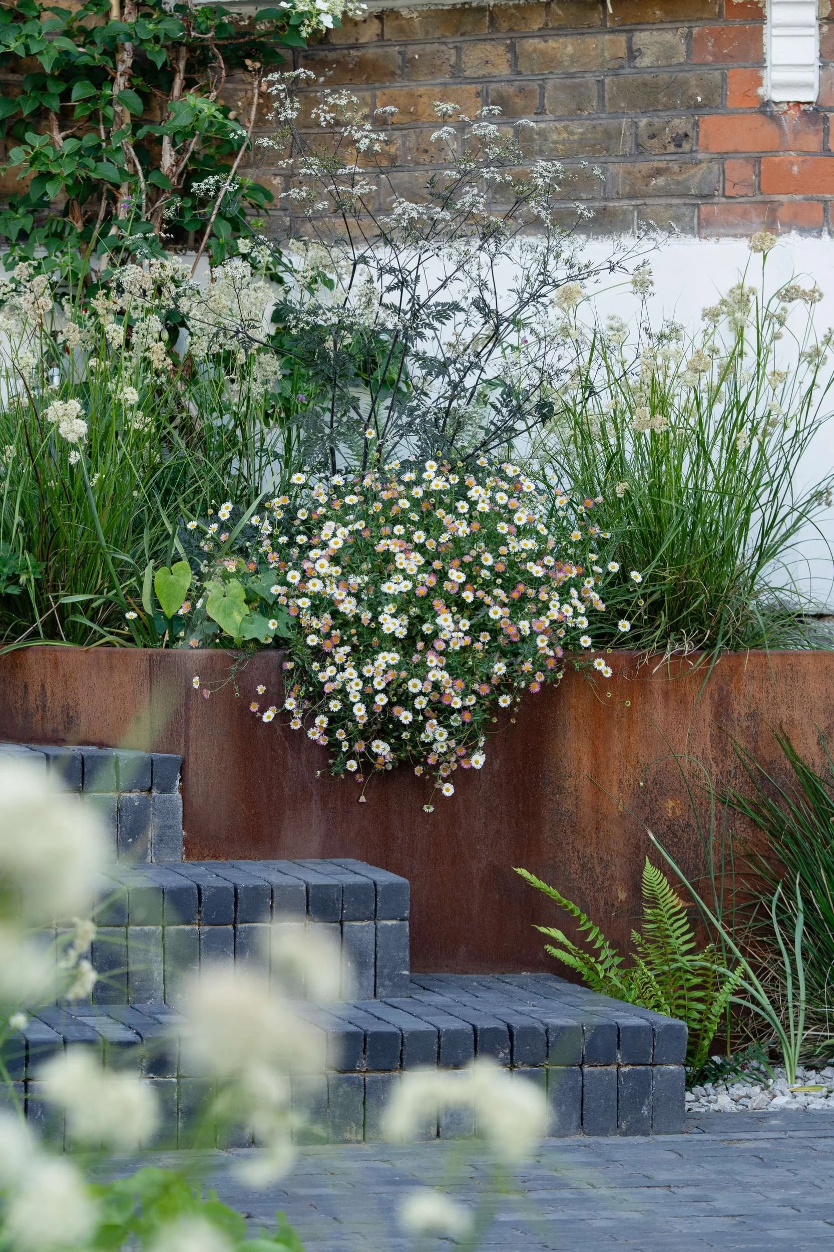 corten-planter-clay-paver-steps-detail.jpg