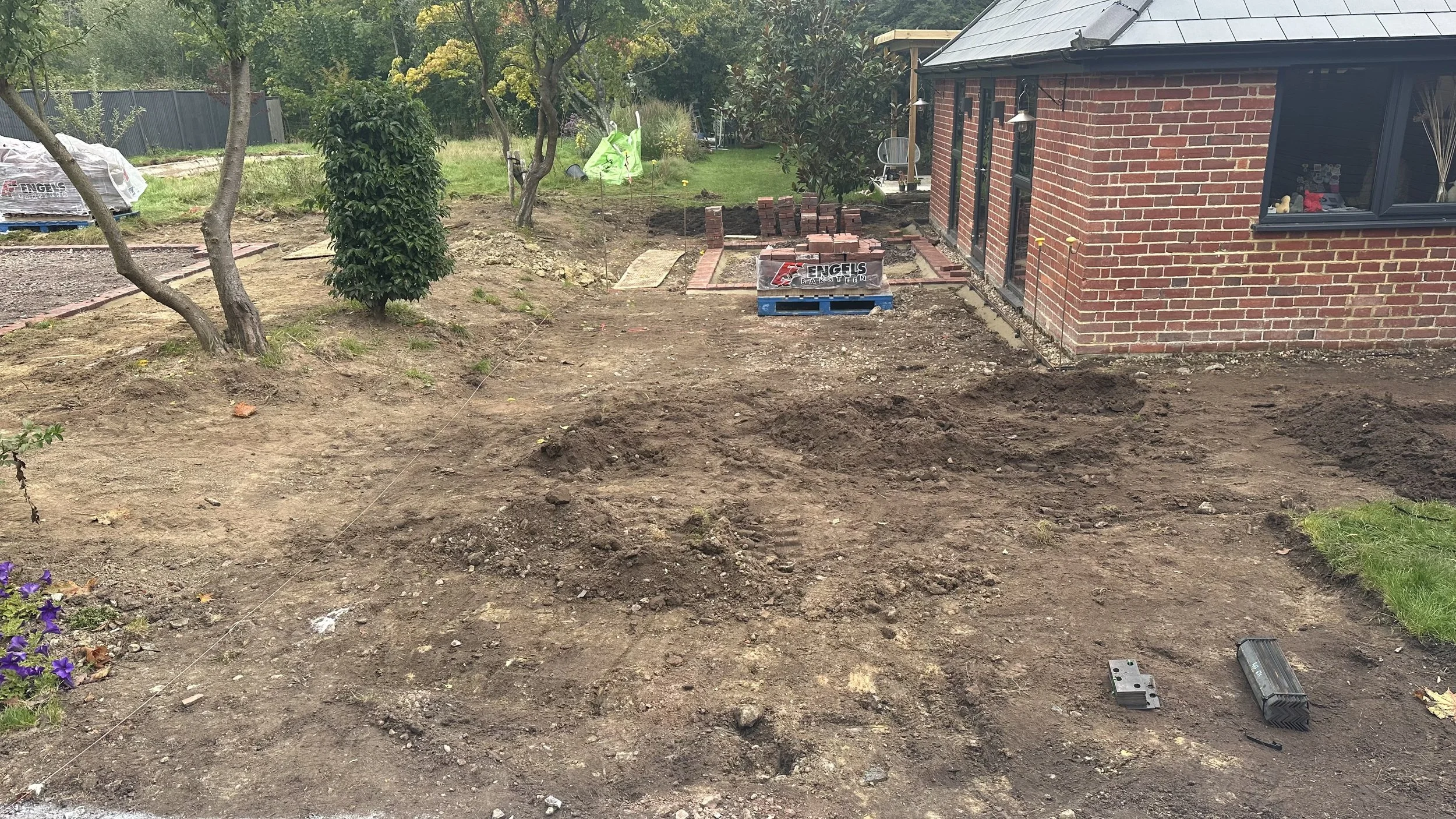Clay paver terraces being laid