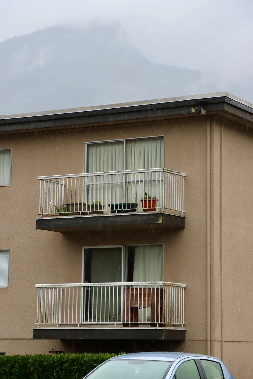 Pre-retrofit conditions at the Tantalus housing project in Squamish. NDY Contracting preparing for a deep energy retrofit in 2026.