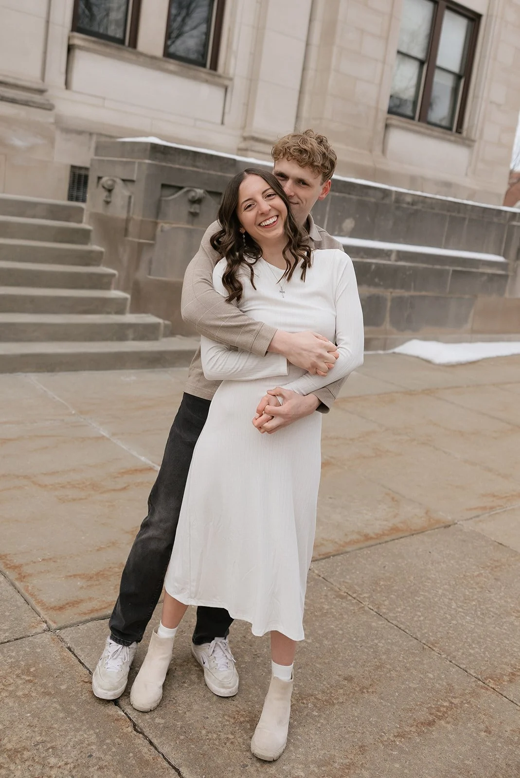 Candid downtown engagement photos in Baraboo Wisconsin