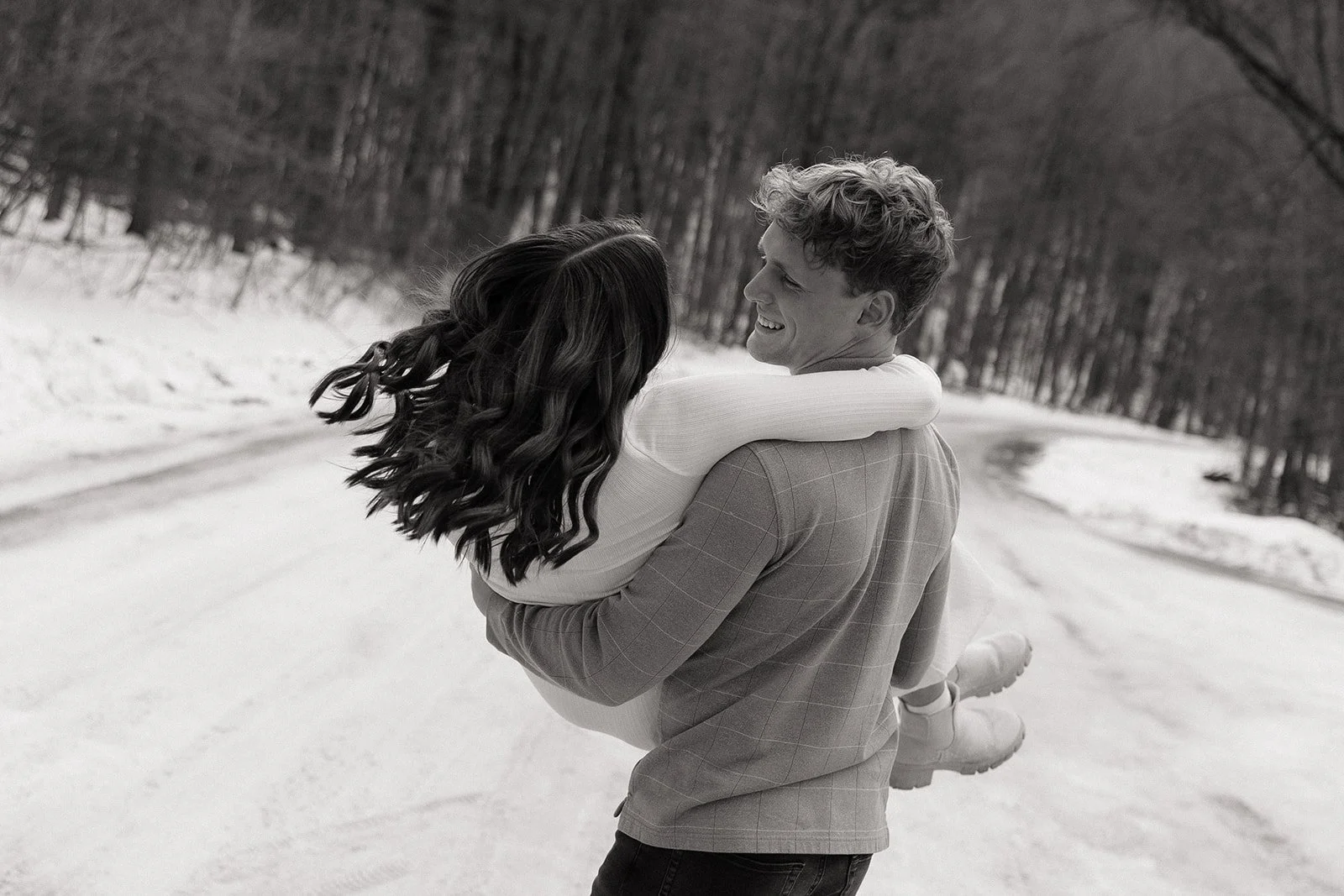 Snowy engagement photos at Devil's Lake in Baraboo Wisconsin