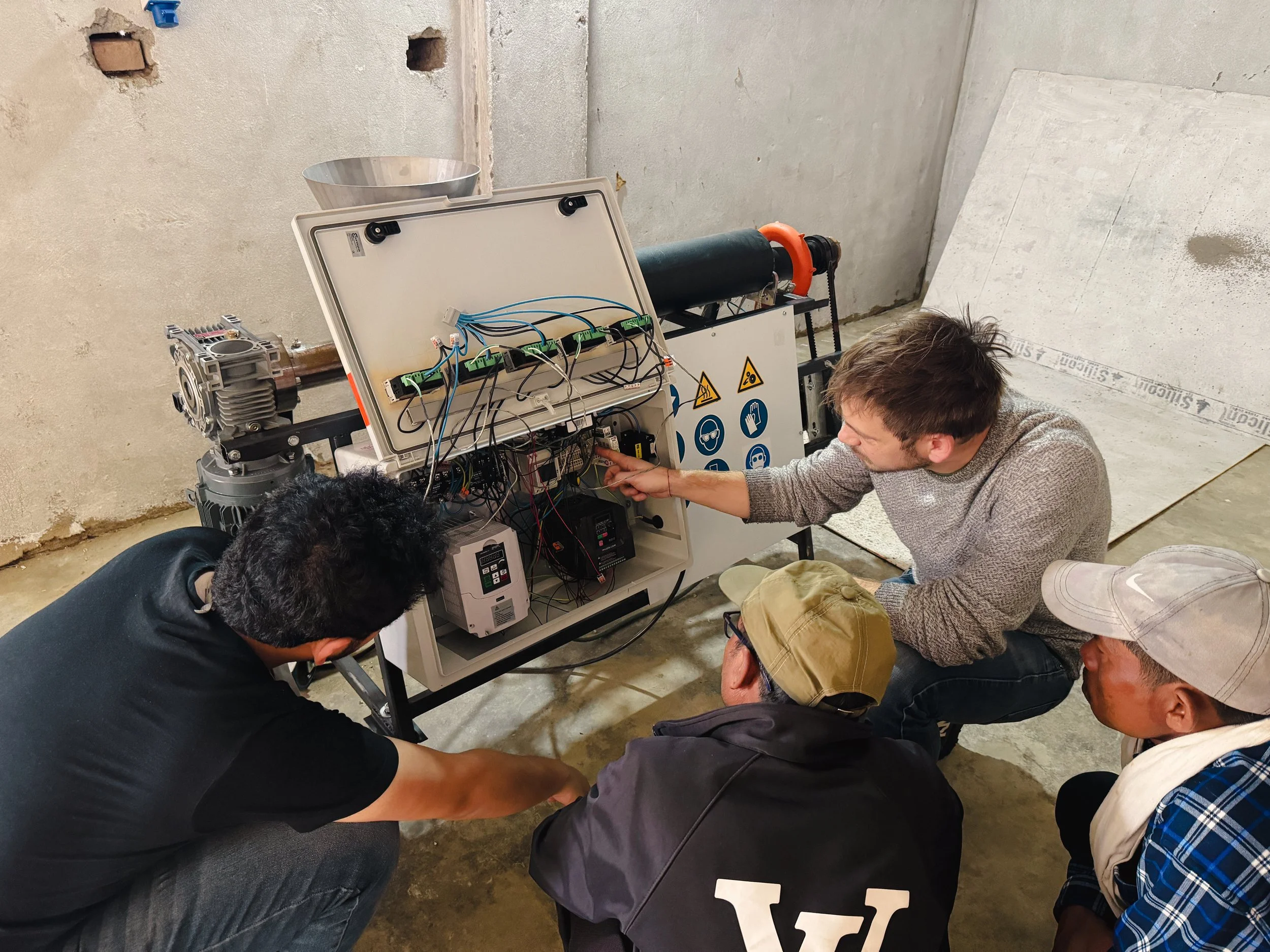 PIPER Project, training and explanation of the machine maintenance protocols, The Polyfloss Factory, World Vision International Nepal and the Response Innovation Lab, Nepal, 2024. Credits: The Polyfloss Factory.