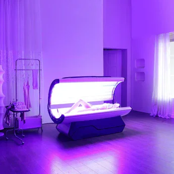 woman doing red light therapy after a pilates class at infinity fitness, a reno lagree and pilates studio
