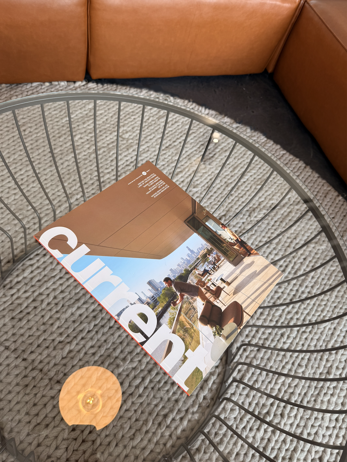 Agency Loft Coffee Table Styling with Design Magazine and Textured Rug