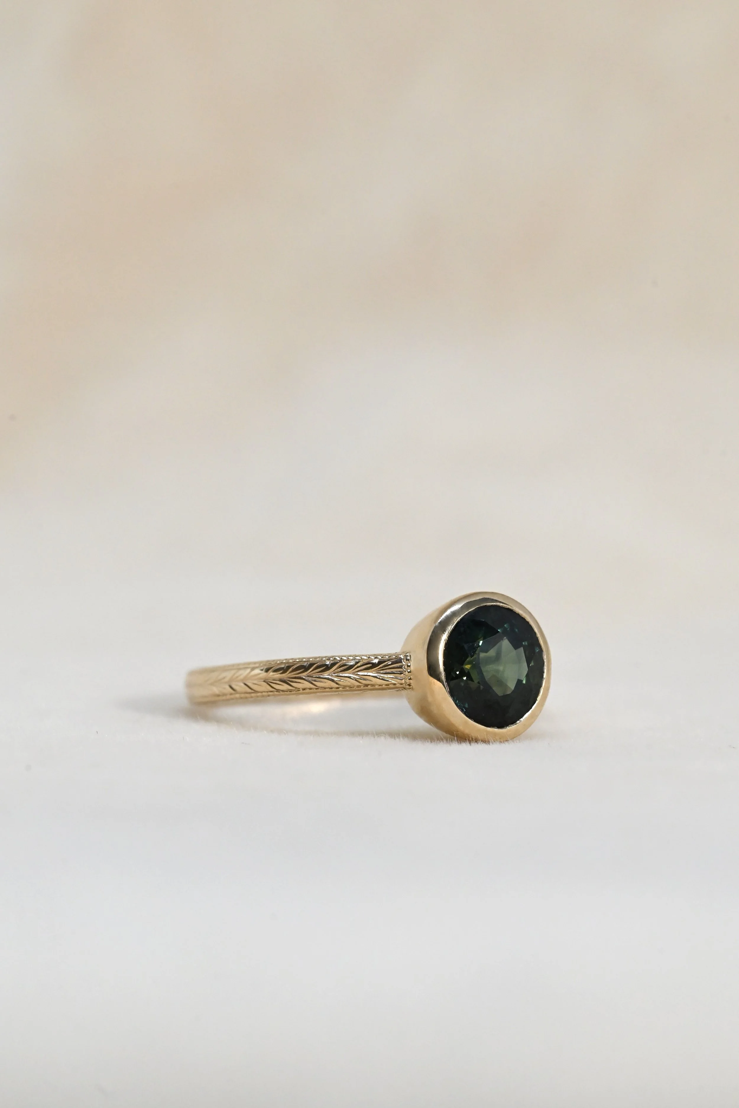 EC-R0024-Wednesday-1.71ctAustralianGreenRoundBrilliantSapphire-SIDE.JPG