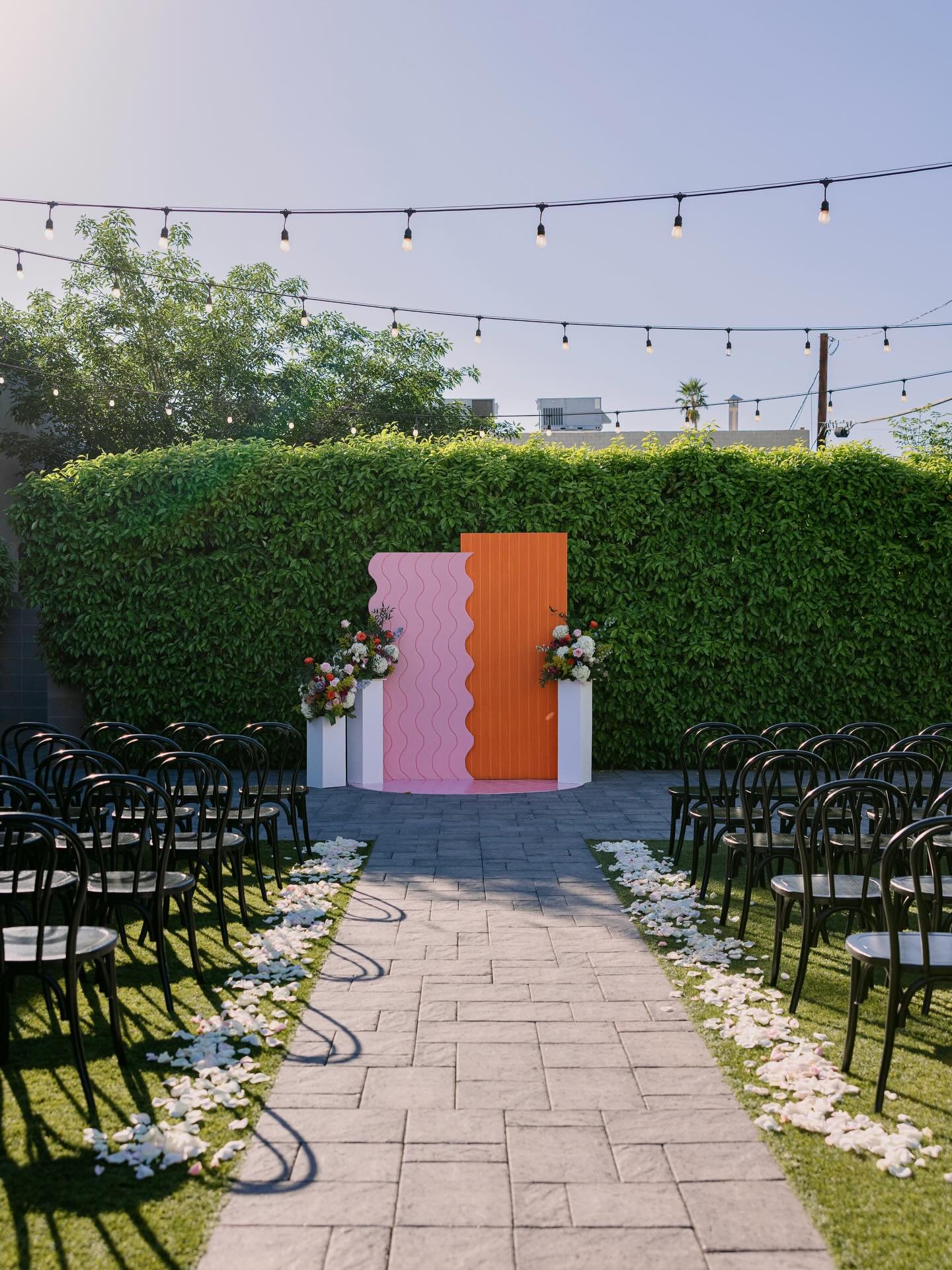 Planning an outdoor ceremony in Arizona and want something that actually feels elevated? 🌿✨

We designed this custom ceremony setup with layered textures, soft waves, and bold color blocking to create a modern, editorial moment right down the aisle.