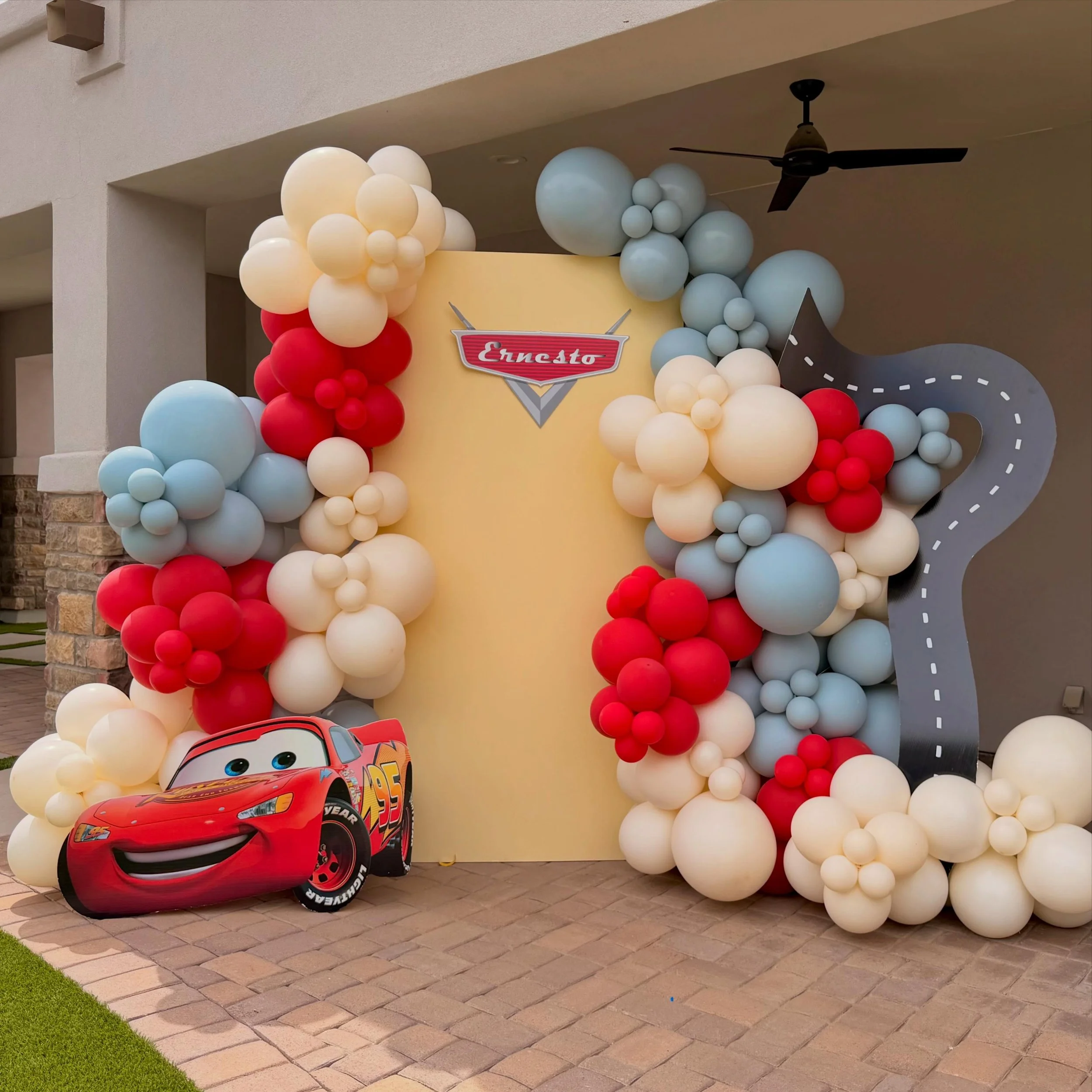 Happy 2nd Birthday Ernesto ⚡️🏁
We brought Radiator Springs to Arizona with this custom Lightning McQueen birthday backdrop featuring oversized balloon installations, themed colors, a road panel, and the cutest Cars-inspired details for the ultimate 