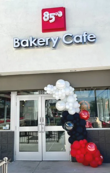 bakery cafe grand opening balloons matching the brand colors