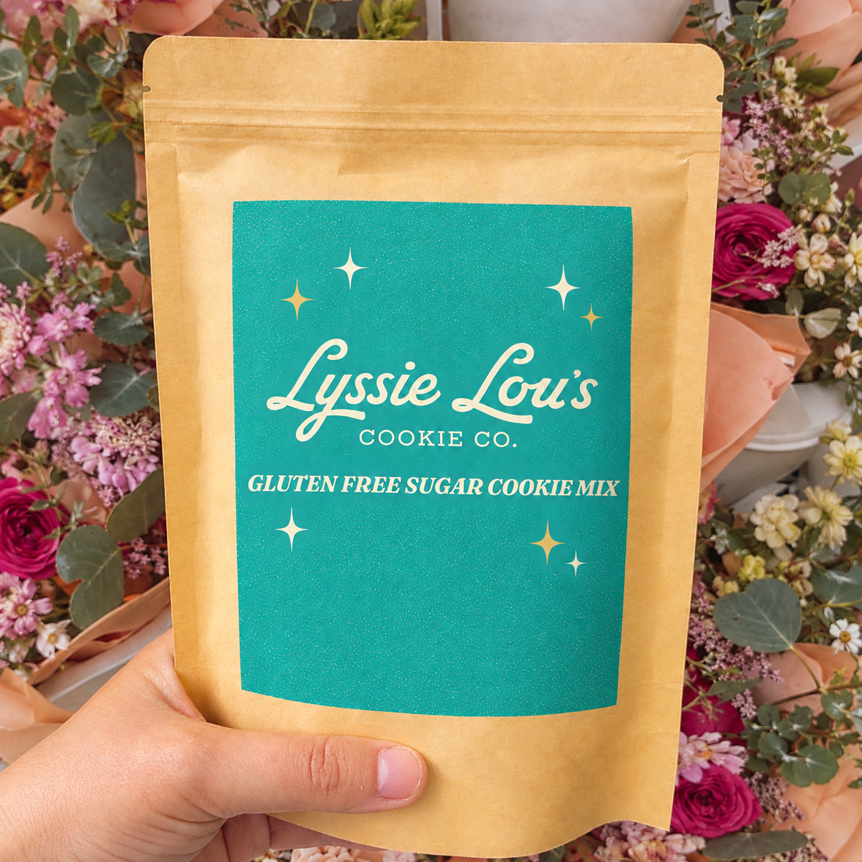 Lyssie Lou’s Cookie Mix Floral Flat Lay.png