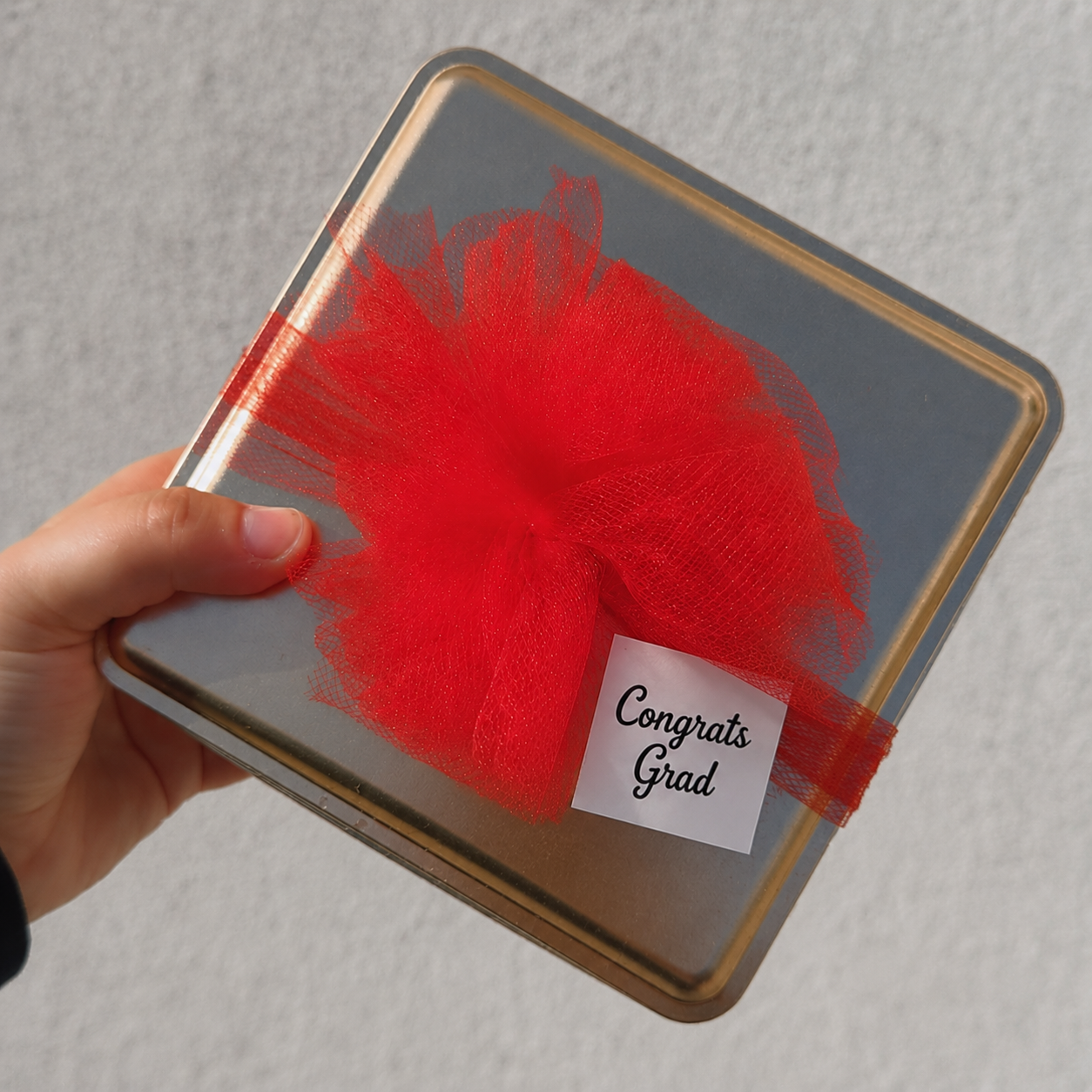 Gift-Wrapped-Tin-Graduation.png