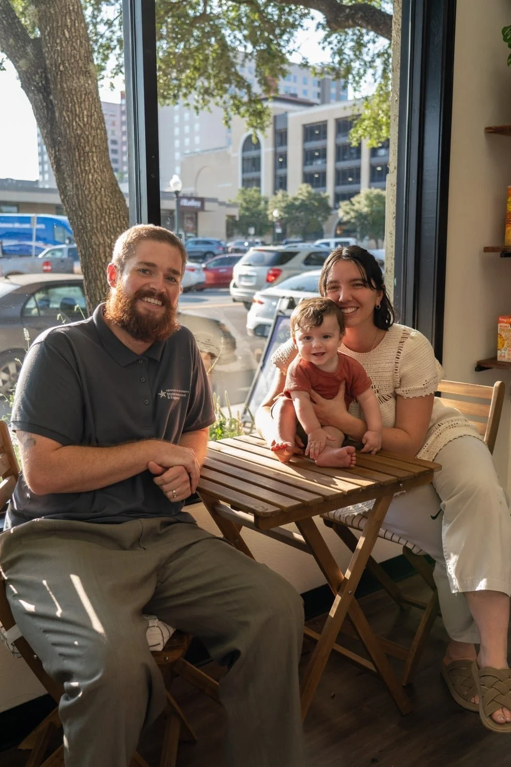 Ollies Market Owners, a man, a woman and a baby