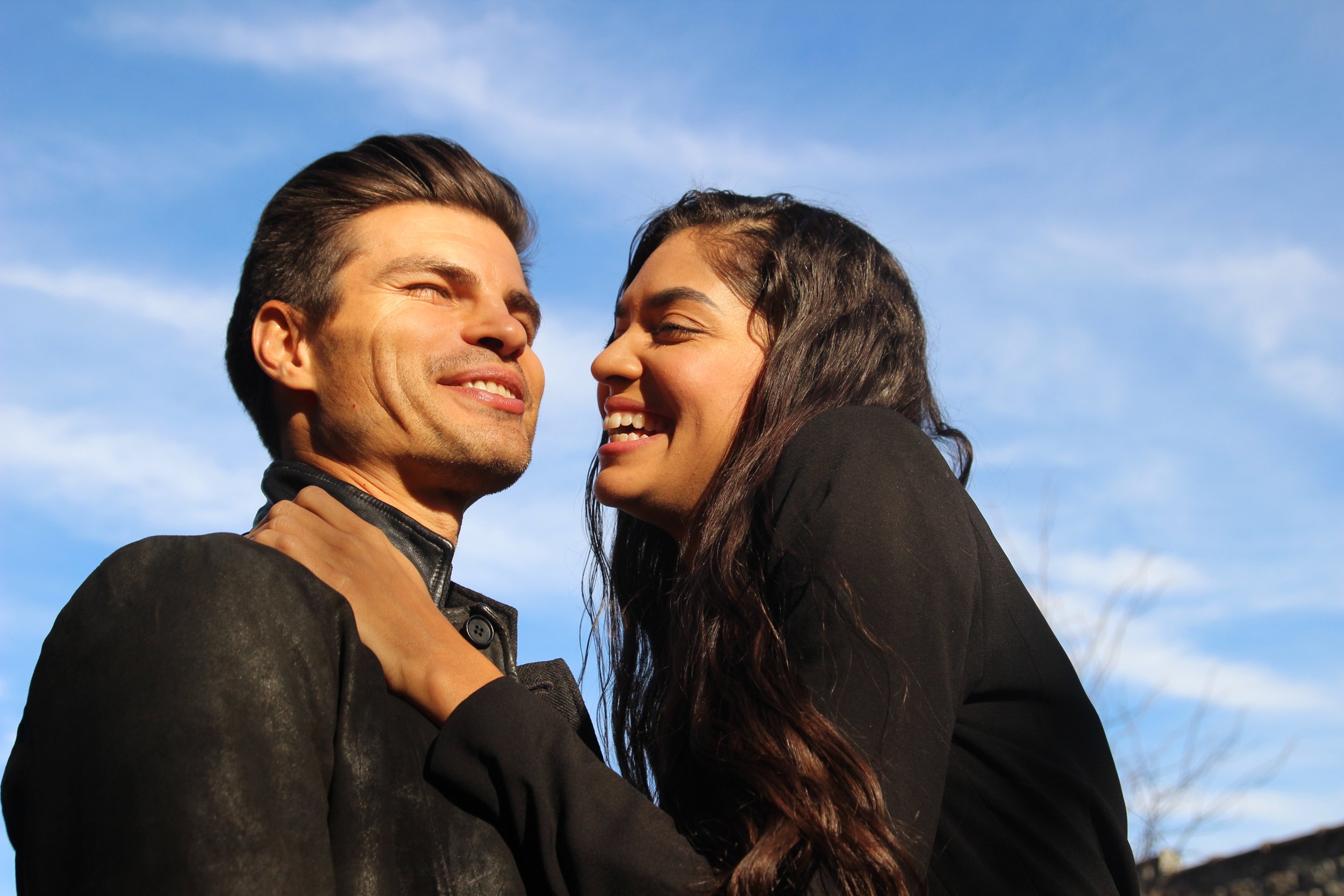 Couple Smiling Holding.JPG