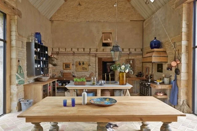 Trinity - Gloucestershire - photoshoot and film location. 17th Century renovated Cotswold barn. Each barn has its own unique feel with a mixture of modern and rustic. Centered around a large courtyard with olive trees and lavender and during Summer m