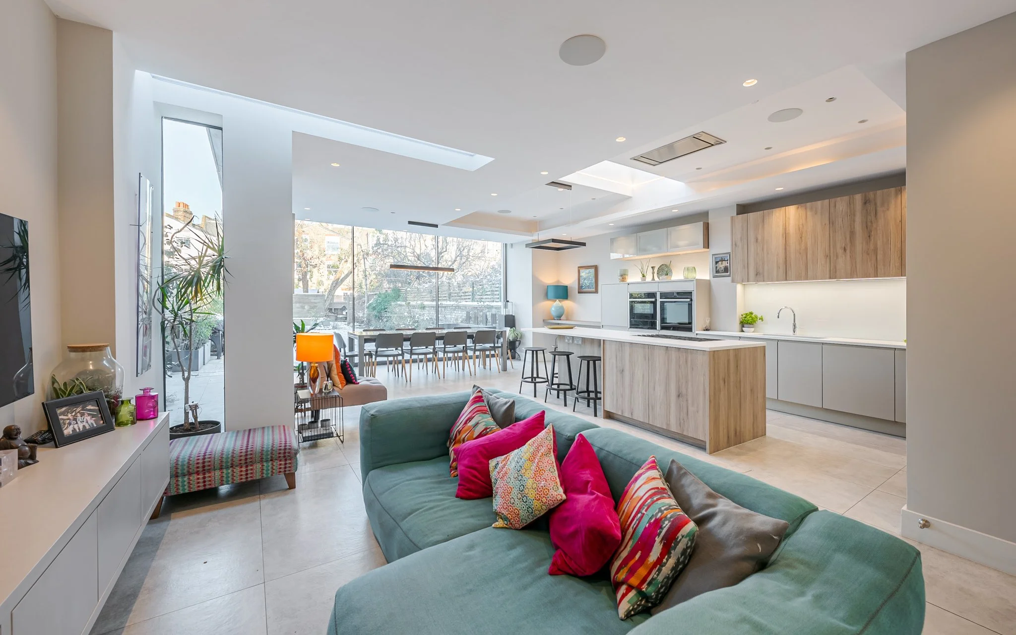 Ritherdon - Wandsworth, photoshoot and filming location. Large extended open-plan kitchen diner connecting to the terrace via large glass doors, teenage bedrooms and a classic London red-brick frontage - the classic London family home look.

Located 