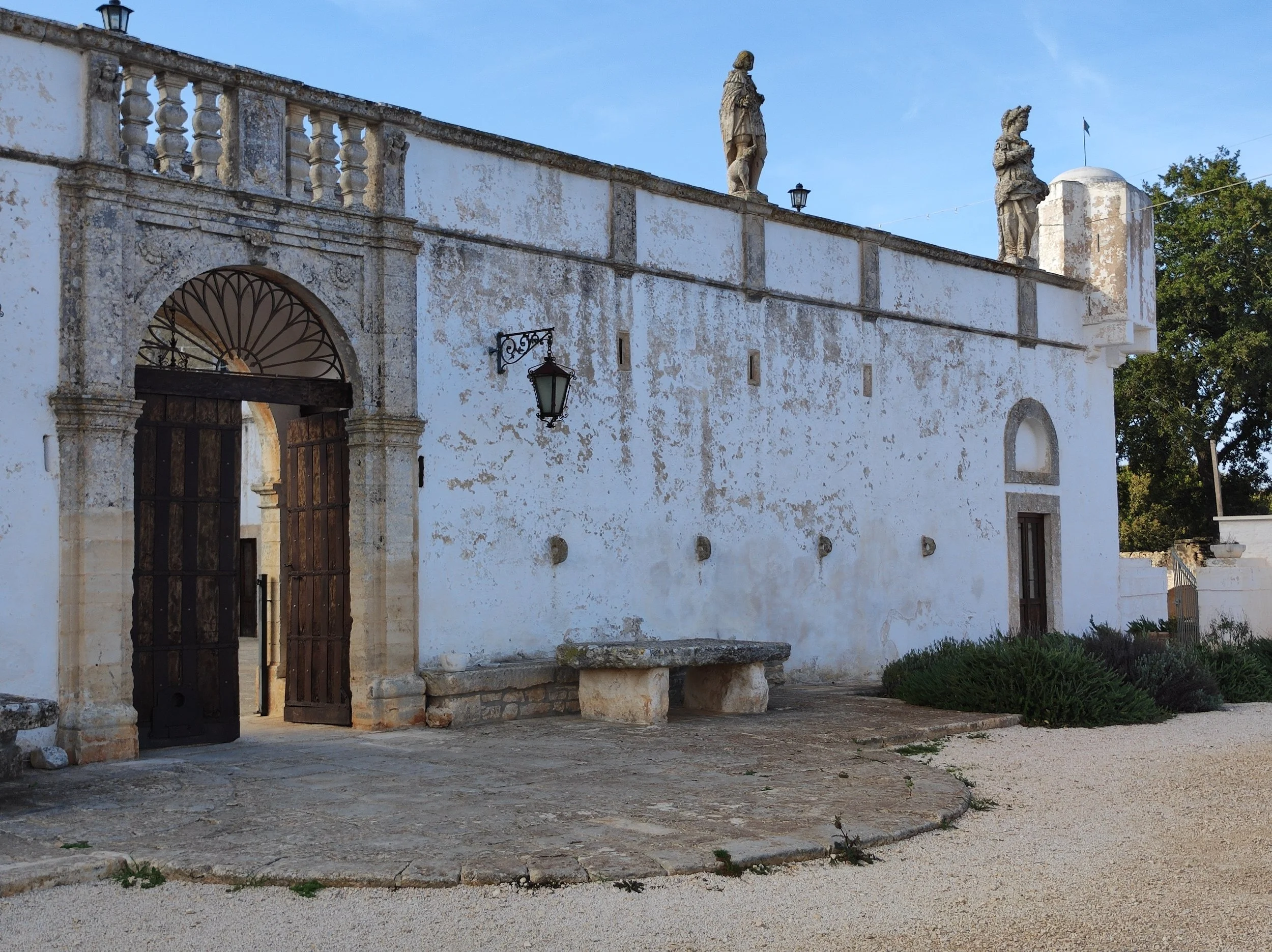 Palesi - Puglia, Italy -  Palazzo Photoshoot and film location with courtyards and terraces in the rural south of Italy. Surrounded by traditional stone walls and rural landscapes, with old farm buildings and olive trees, set in the Mediterranean cou