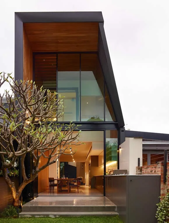 Modern open-concept home interior designed and built by Toronto General Contractors Inc., showcasing seamless integration of kitchen, dining, and living spaces.