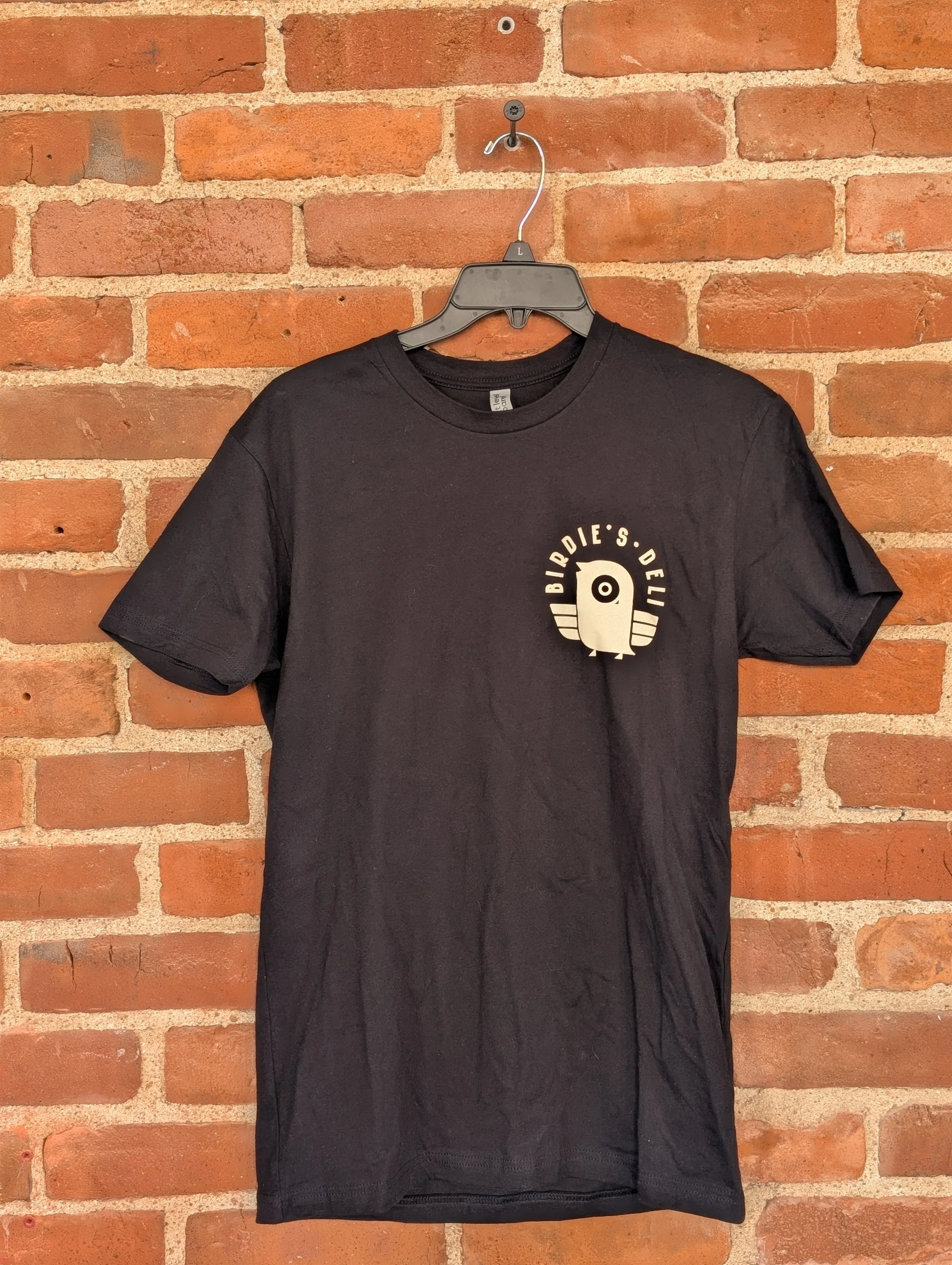 Black Birdie's shirt