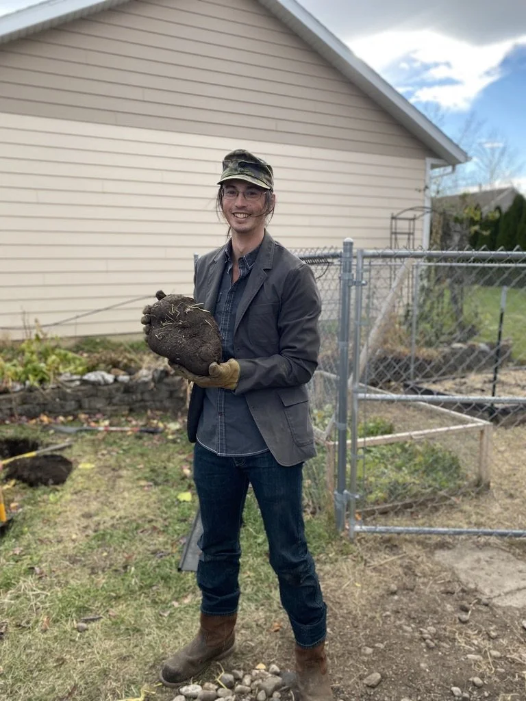 "I think this bleeding heart would look great right here!" 
(Oliver with a rock pt. 2)