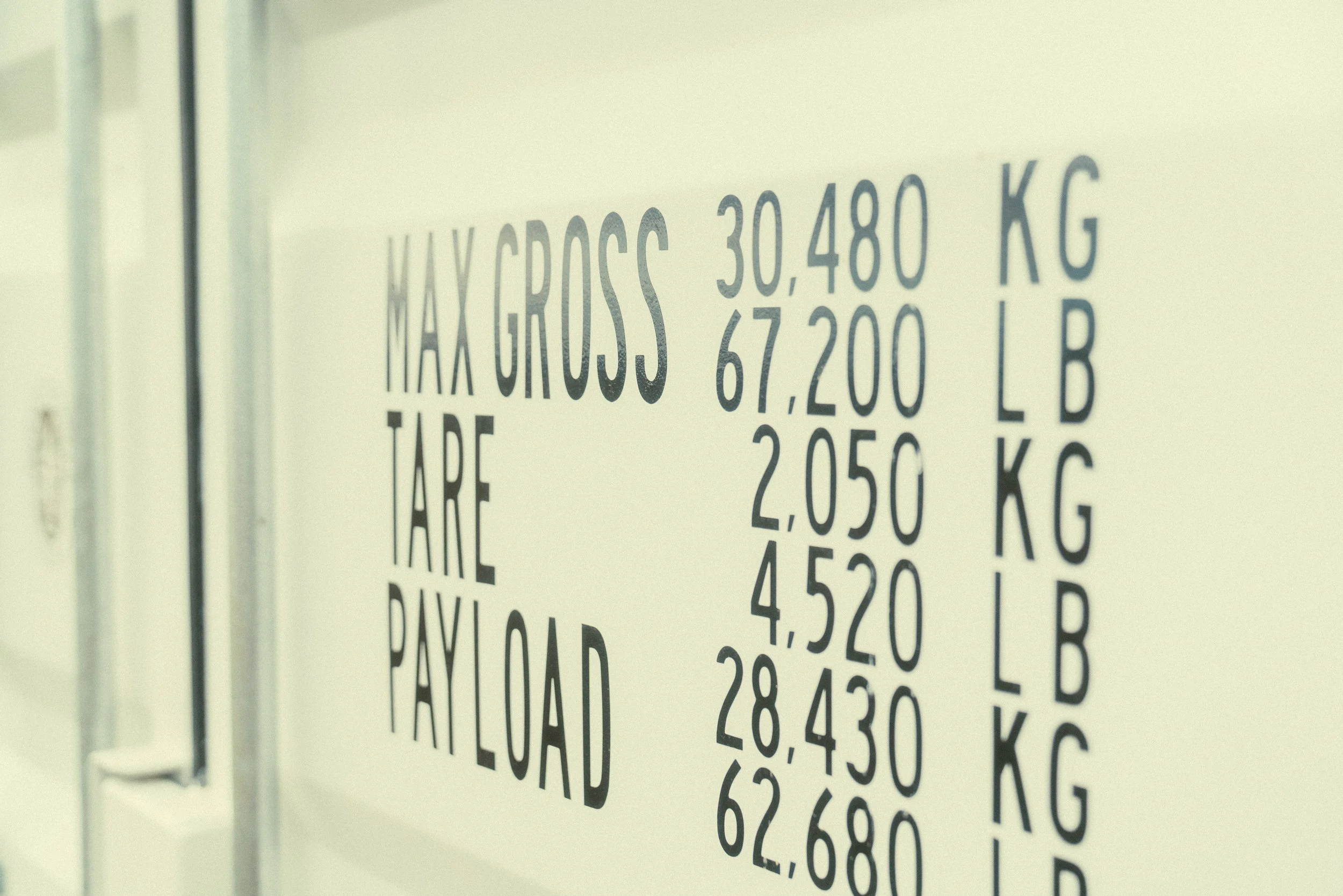 Close up of storage container with Max Gross weight limit of 30,480 KG or 67,200 LB