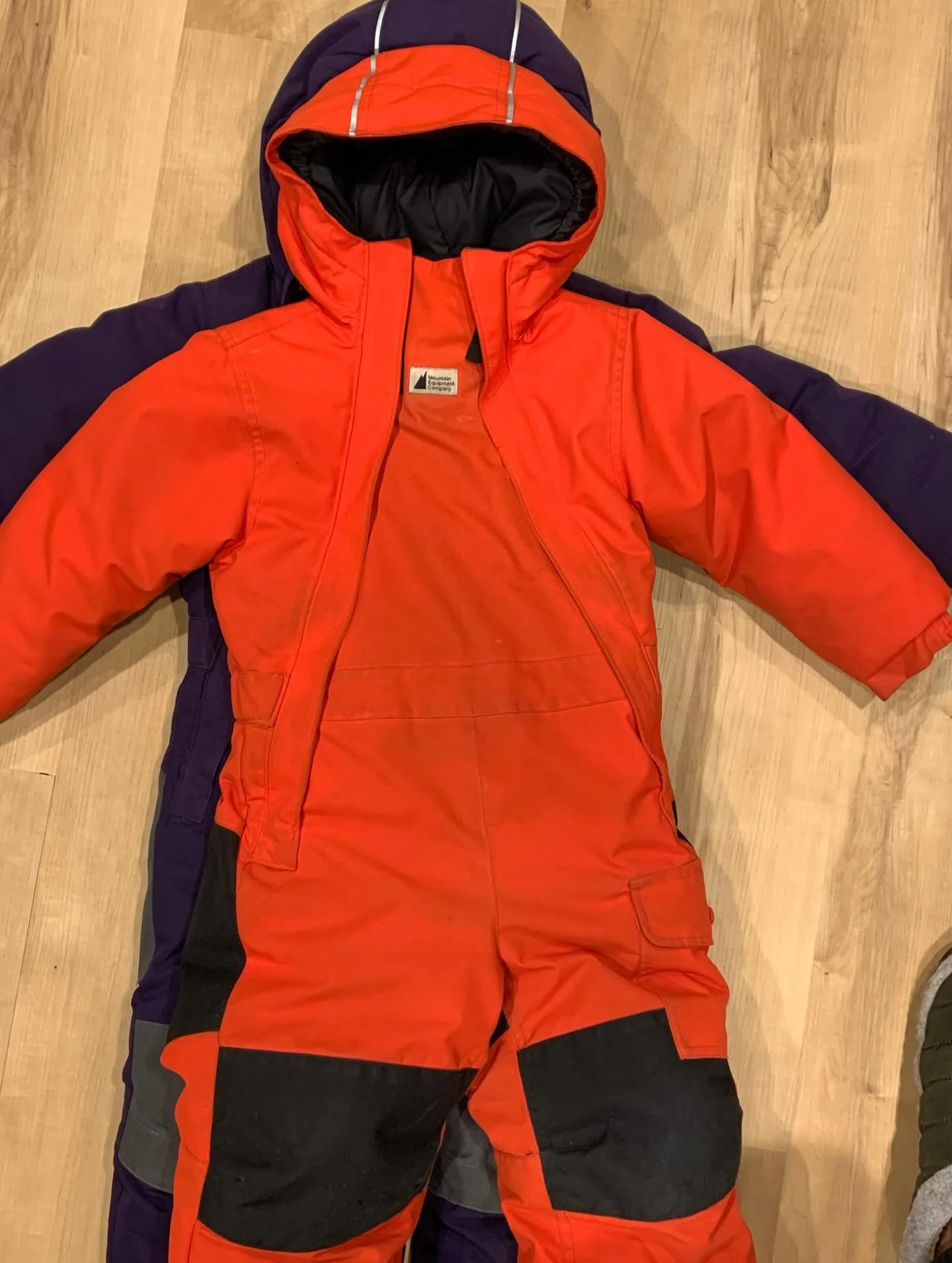 IYKYK. The struggle with kids and zippers all the way up is real - folding down the front flap often ruins the zippers on the MEC toaster suit. I think I've found a fix: stop the zipper at the fold and use velcro for the top. Easy to repair when the 