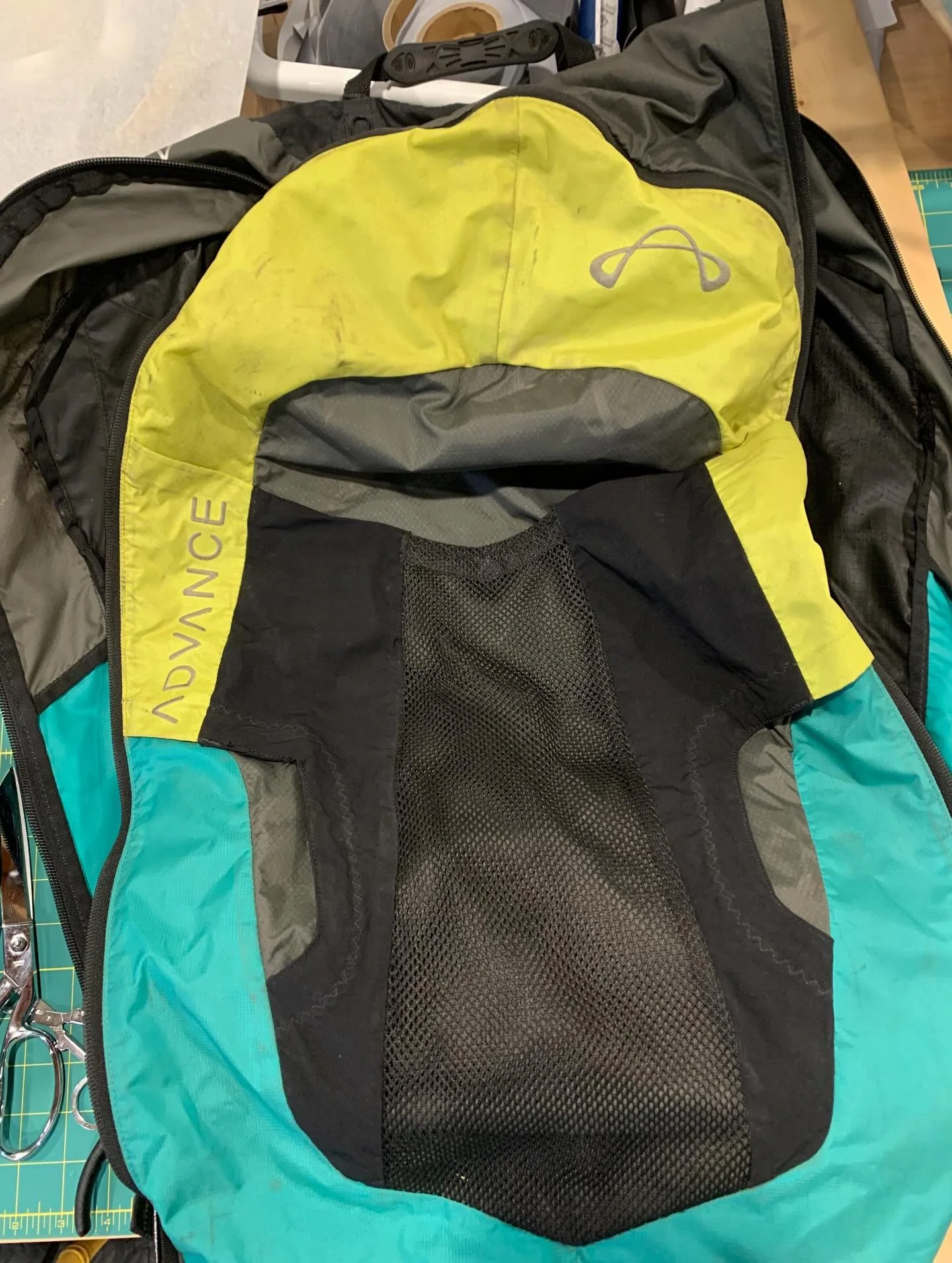 There's something truly fulfilling about reviving gear or clothing that needs some love! This paraglide bag had been fixed with patches and tape. This time, we replaced the side panels with new ones, sewn in with bias tape. 💪🪡 Now it's stronger and