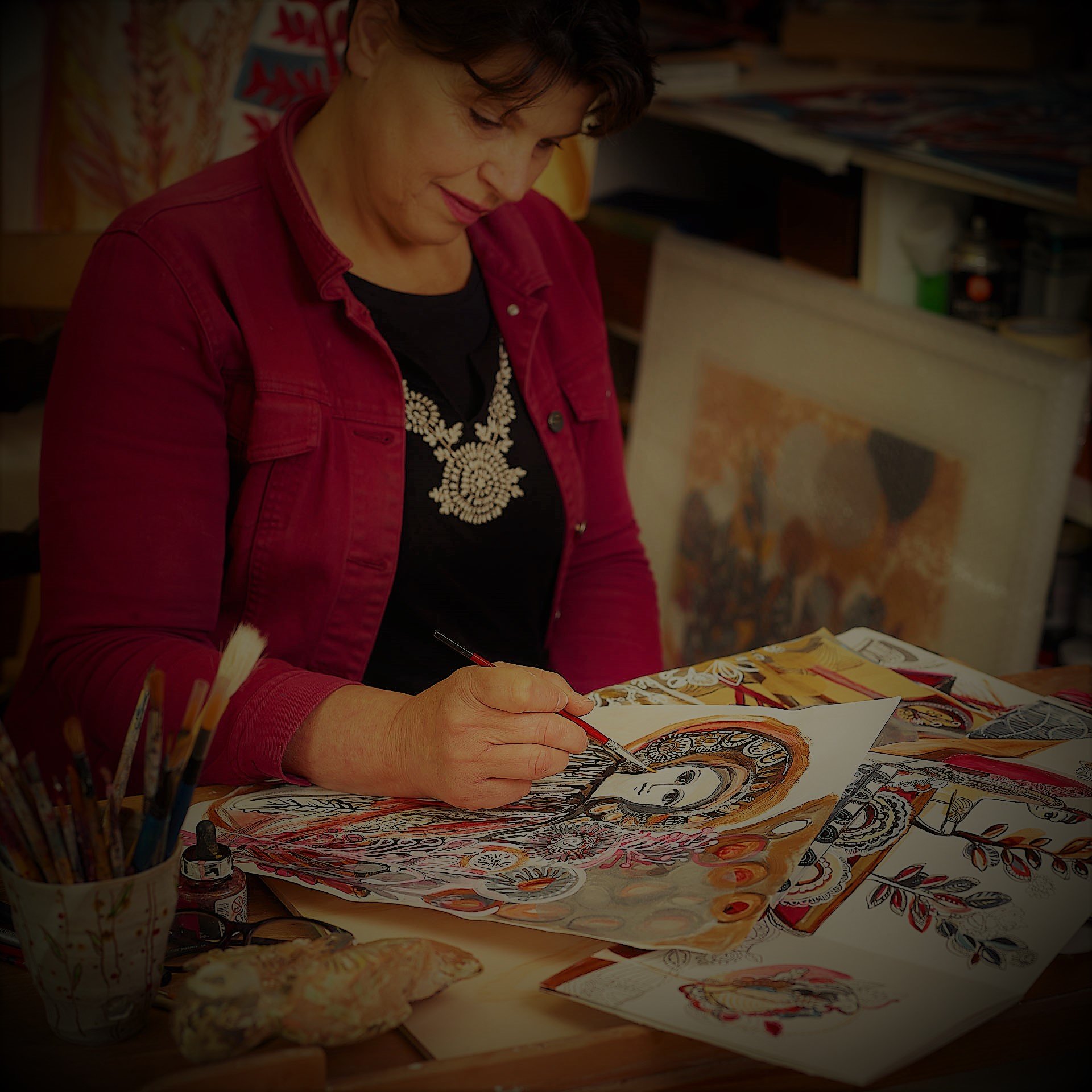 Slavica working on her artwork
