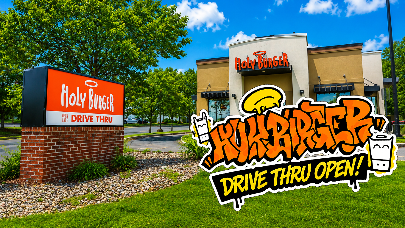 Holy Burger fast food restaurant with drive-thru sign and building exterior, trees, and clear blue sky.