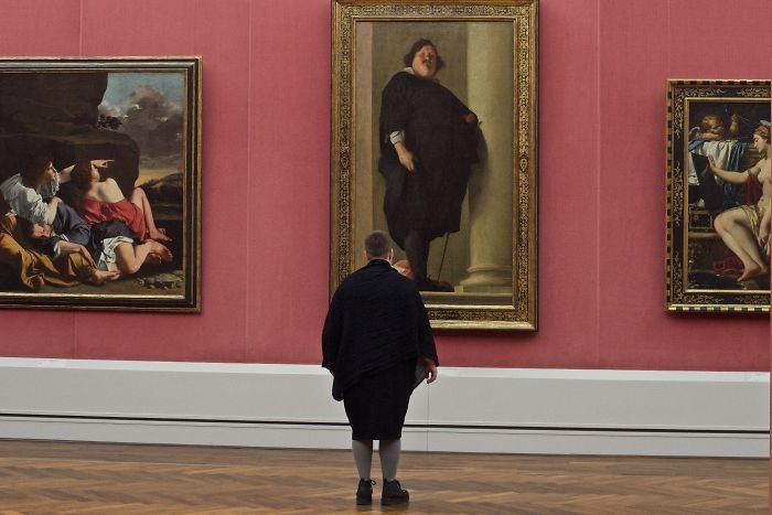 Museum visitors matching artworks