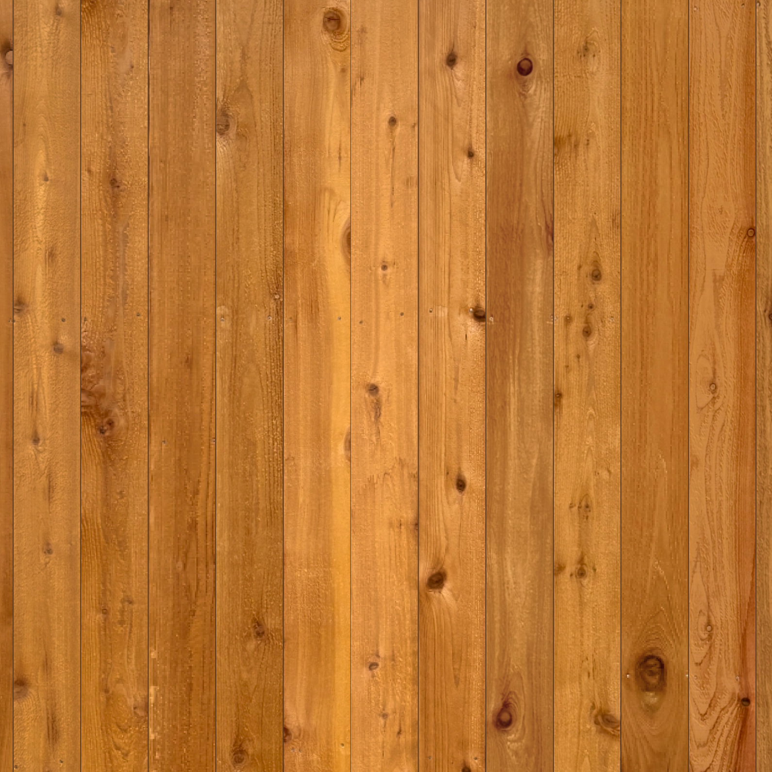 Close-up of a wooden surface with vertical planks and a glossy finish.