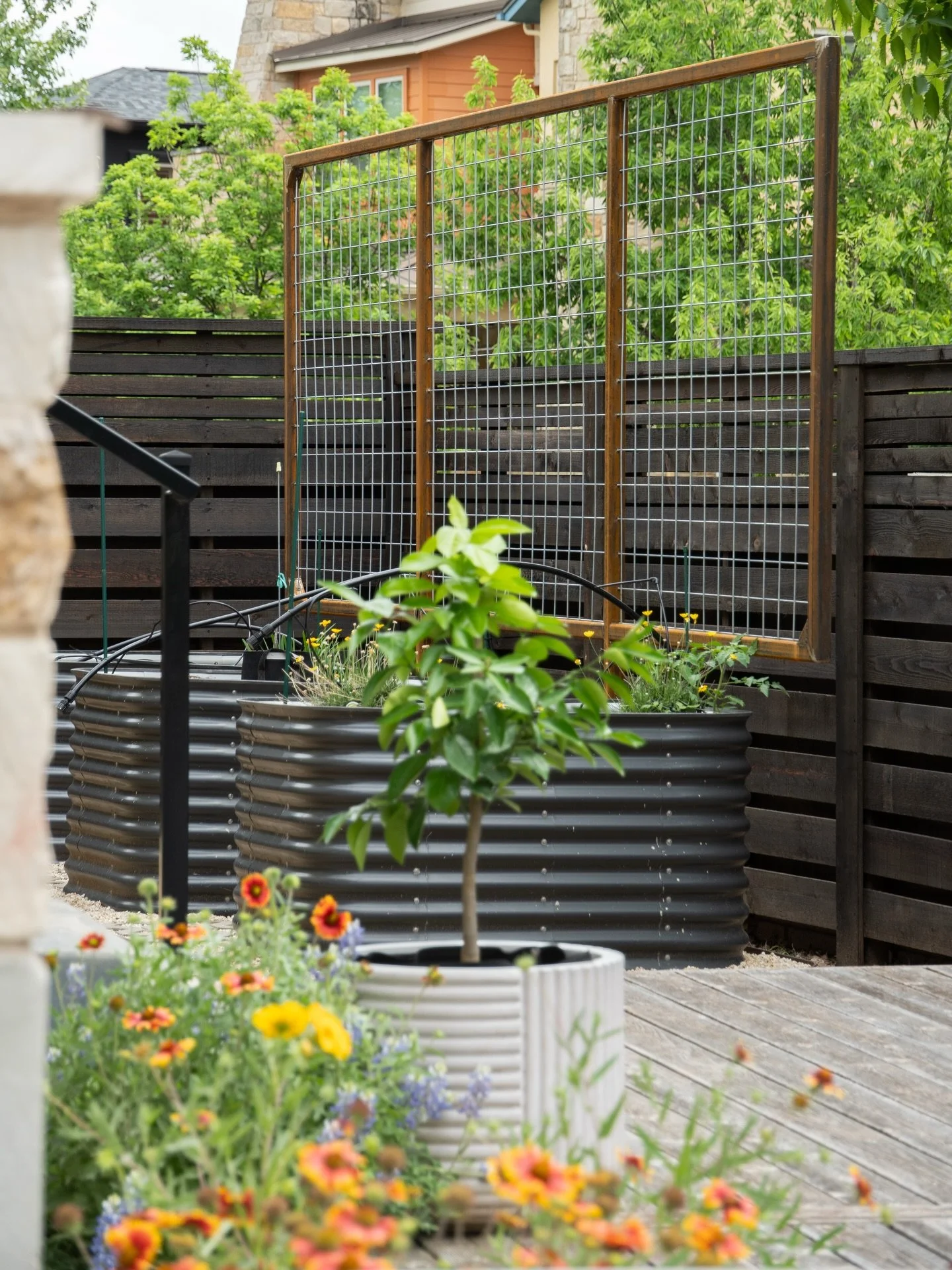 Spring has finally arrived in Austin&mdash;and it&rsquo;s the perfect time to start dialing in your outdoor space. We installed a custom corten steel garden trellis paired with turf stone pavers to add structure, texture, and design to this backyard.