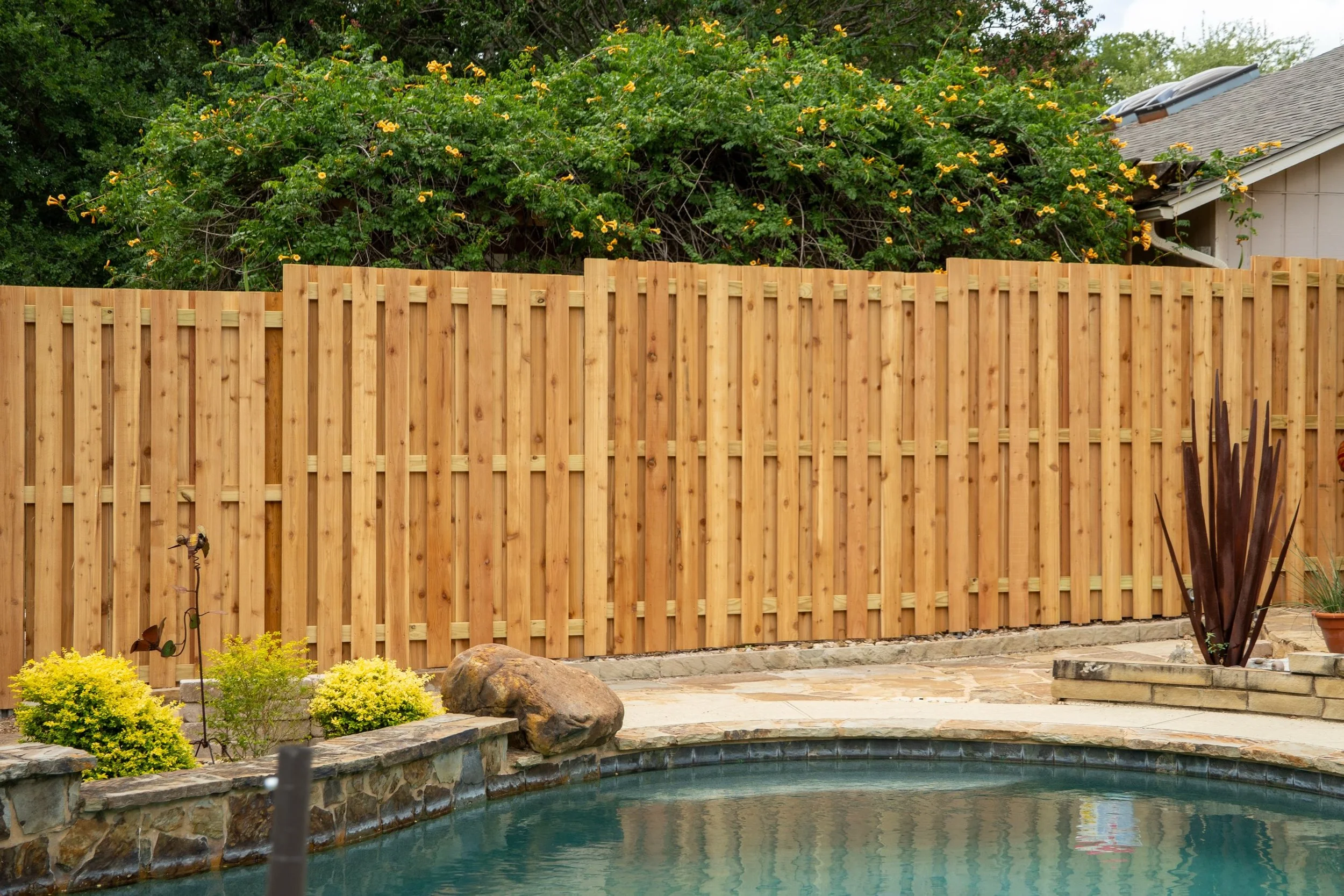 A little reminder that both sides of a fence don&rsquo;t have to look the same.

For this project, we built a vertical privacy fence on one side and a vertical shadowbox design on the other.

One neighbor already had a shadowbox fence along their sid