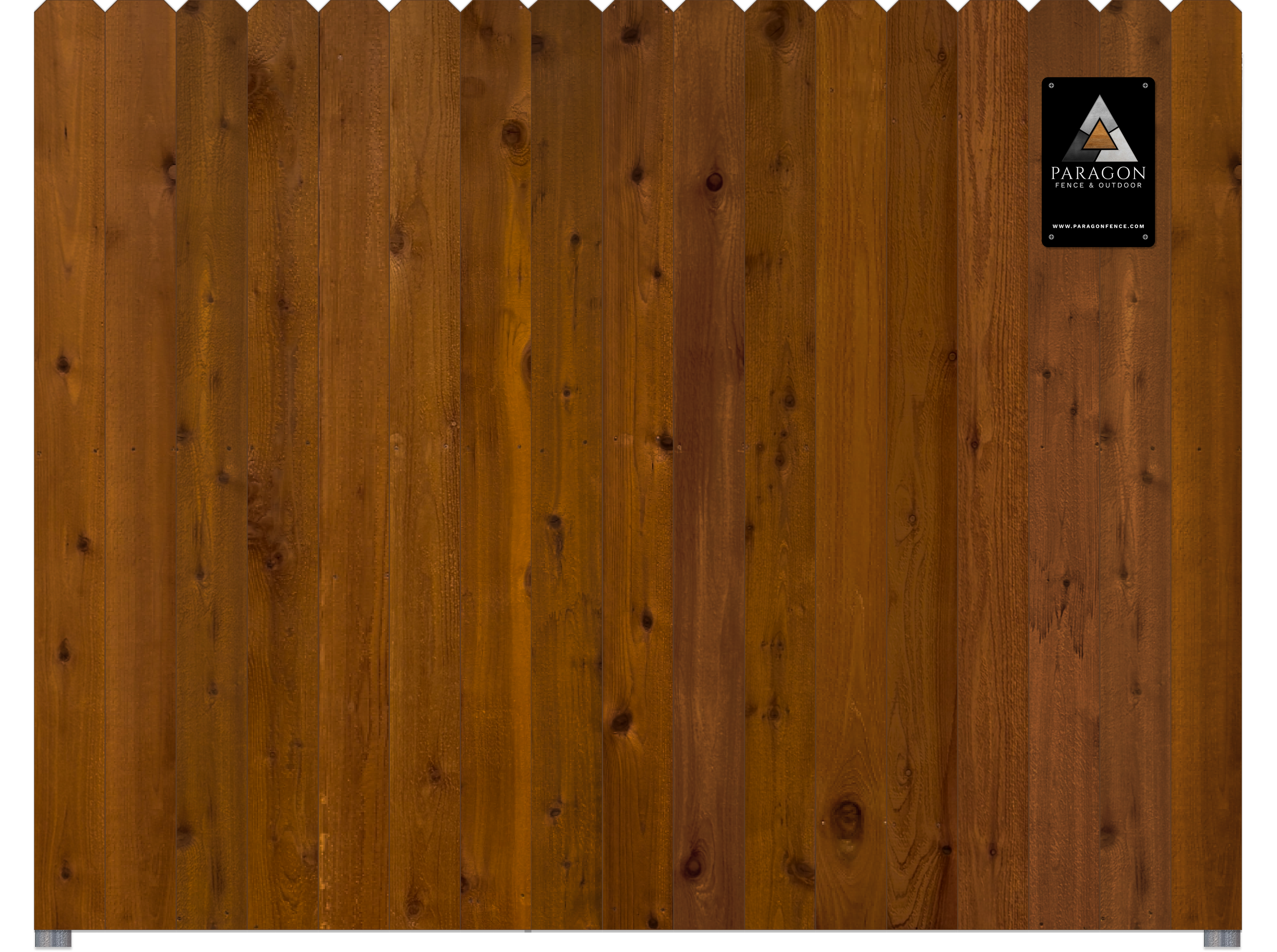 A wooden fence with vertical planks and a black and silver logo plaque in the top right corner. The plaque reads 'Paragon Fence & Outdoor' with a website URL below.
