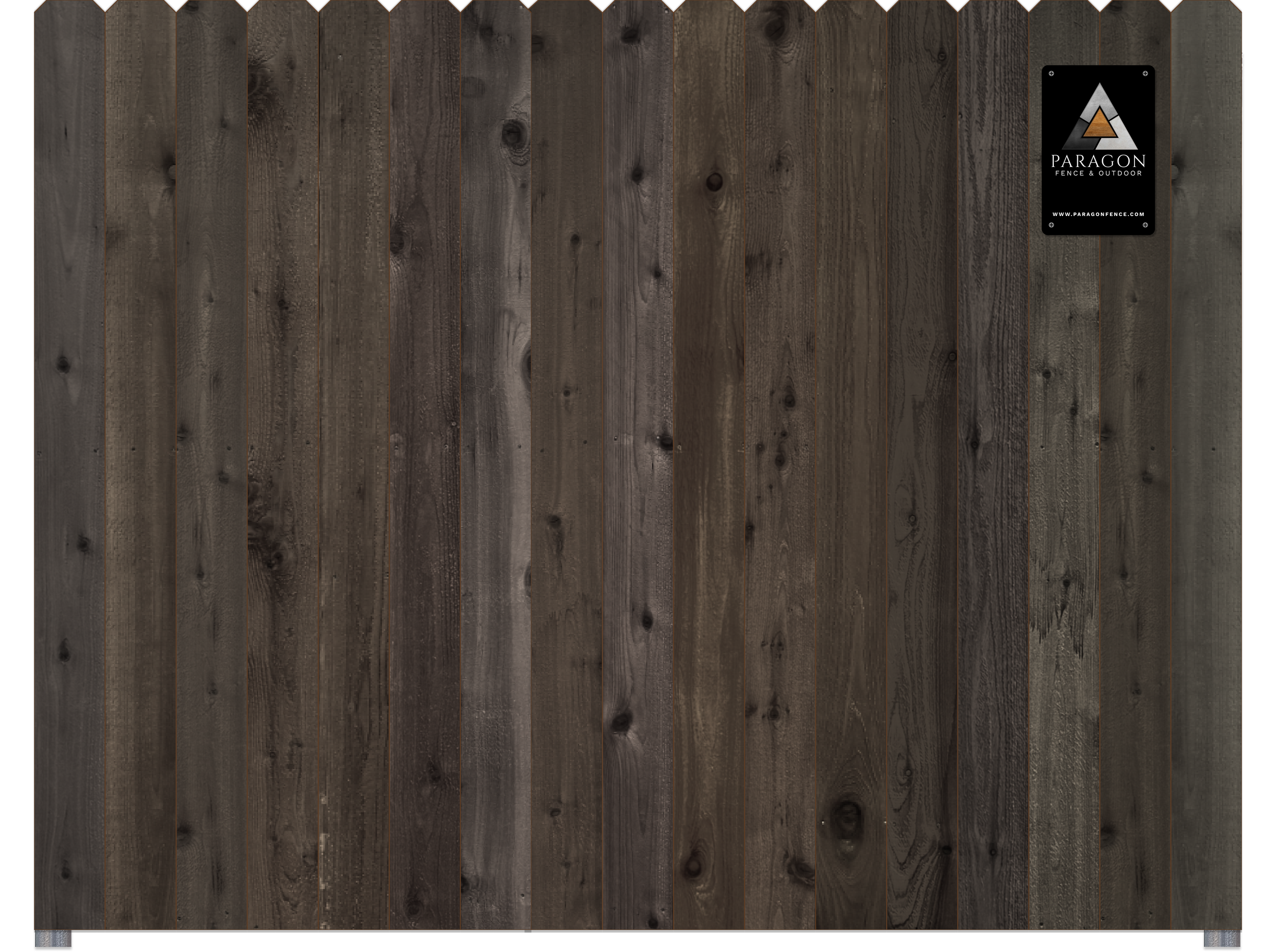 Close-up of a wooden fence panel with a black and silver Paragon Fence & Outdoor logo sign attached at the top right corner.