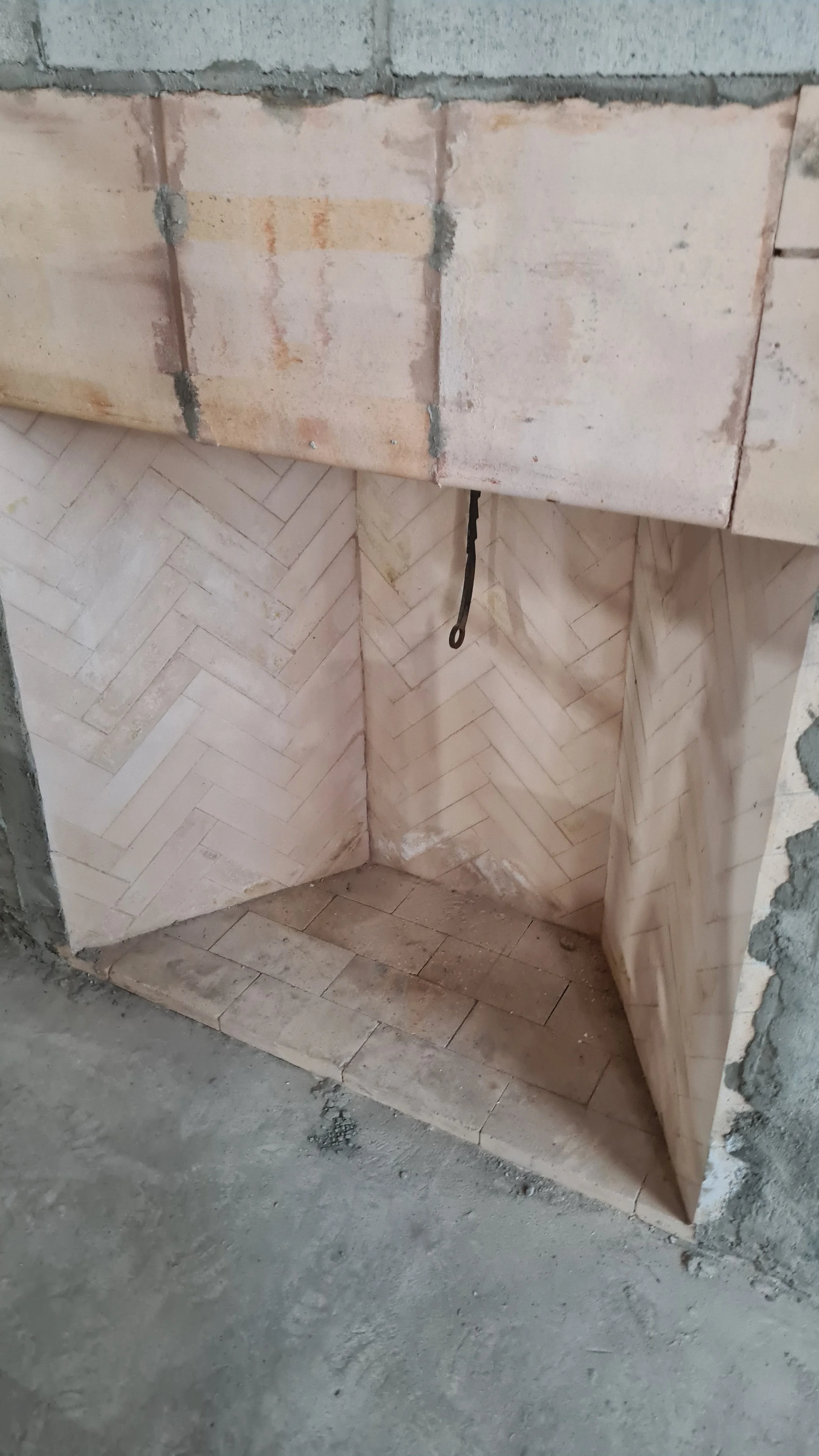 Small Rumford fireplace under construction in Richmond hill.
