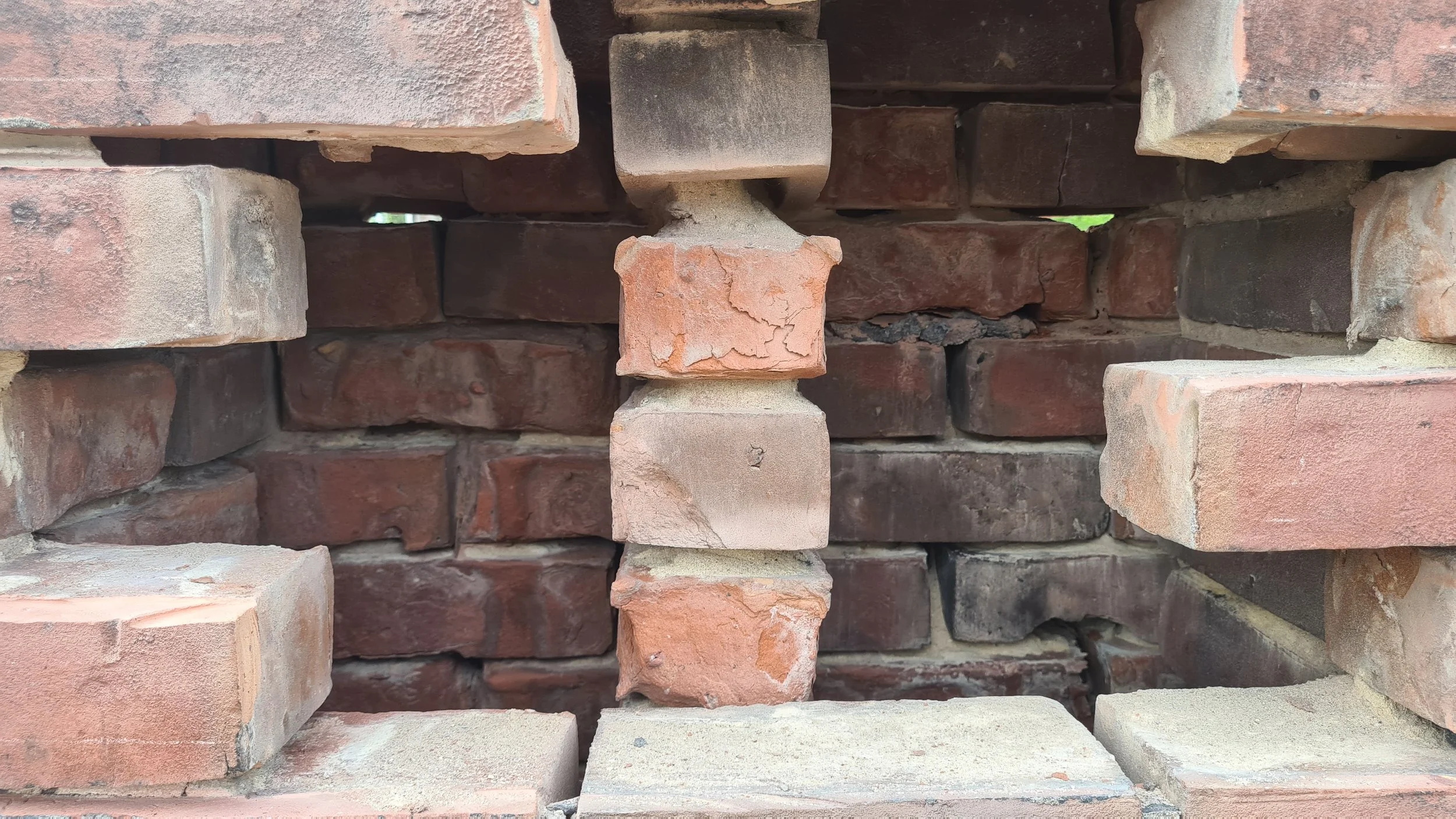 A good example of how bad the deterioration in a Victorian chimney can get. surprisingly it did not look to bad from the exterior, however you can see the mortar has turned to powder.   
