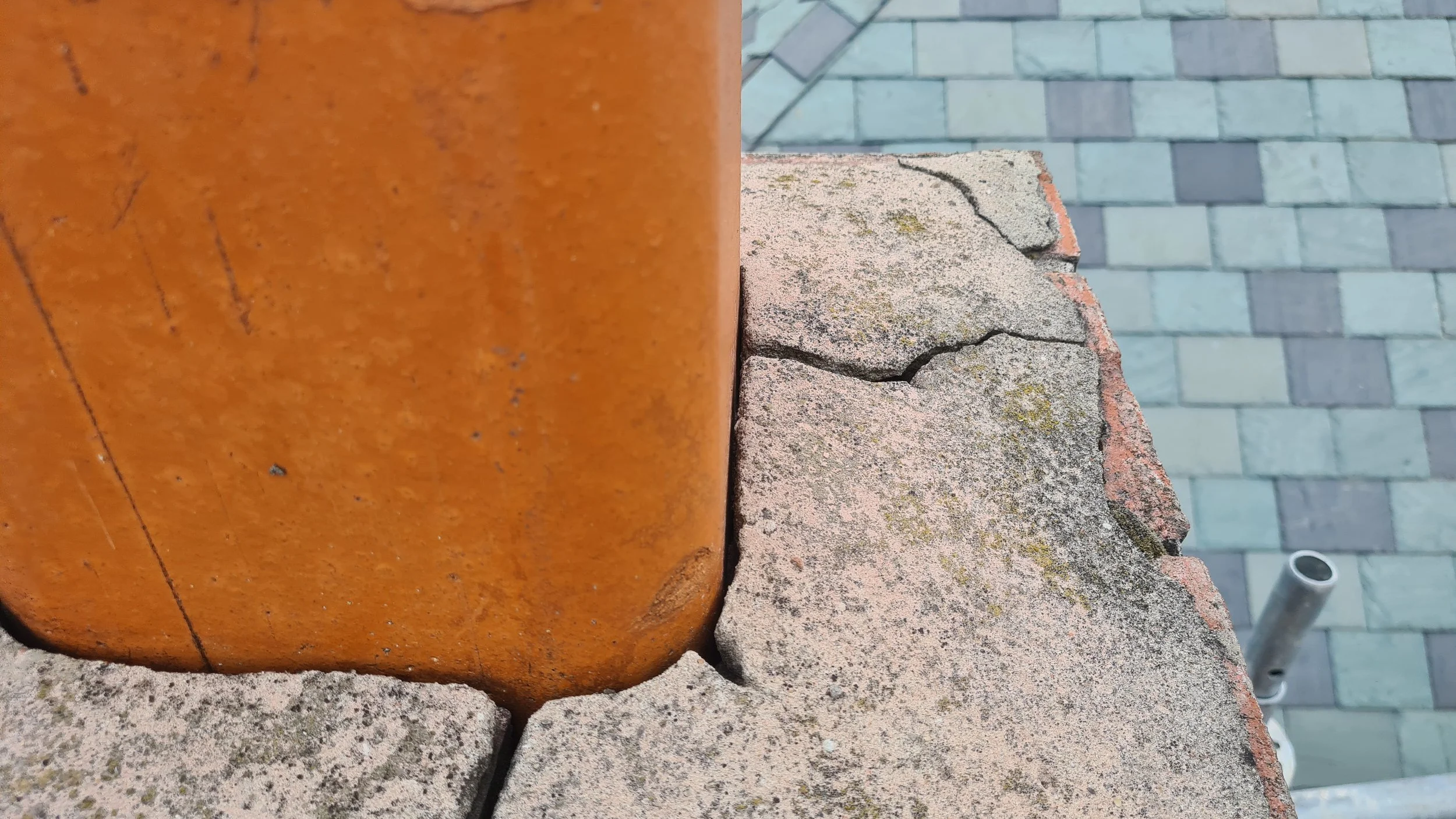 A damaged chimney cap, very common cause of leaks. This chimney was built in 1926 and incorrectly repaired with cement.
This created further damage to the chimney which needed restoring with the correct materials.  