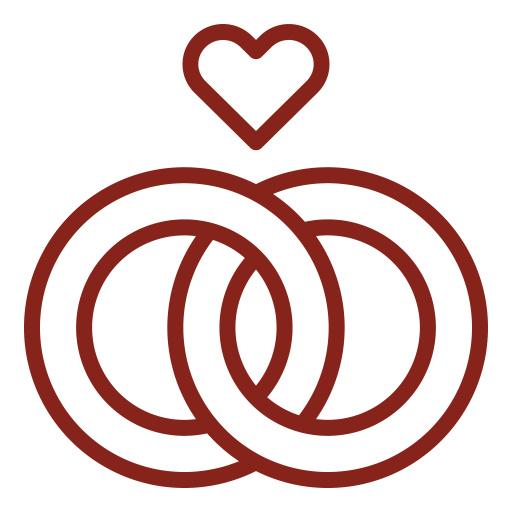 Line drawing of two wedding rings with a heart above them.