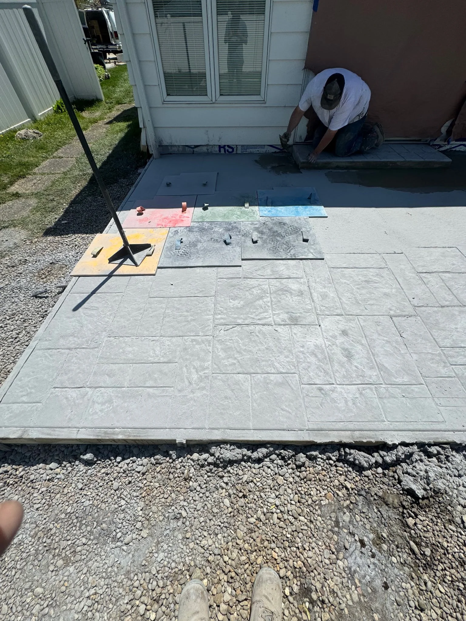 Oranssi technician working on a roof project