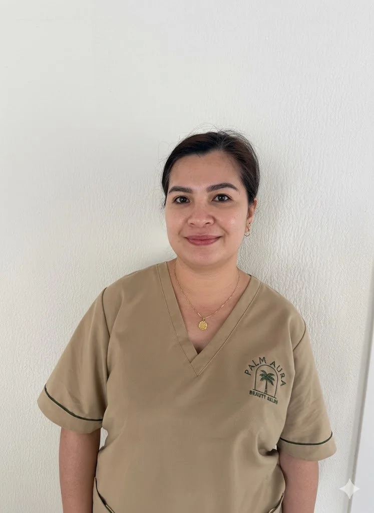 Abu Dhabi home massage therapist picture wearing uniform
