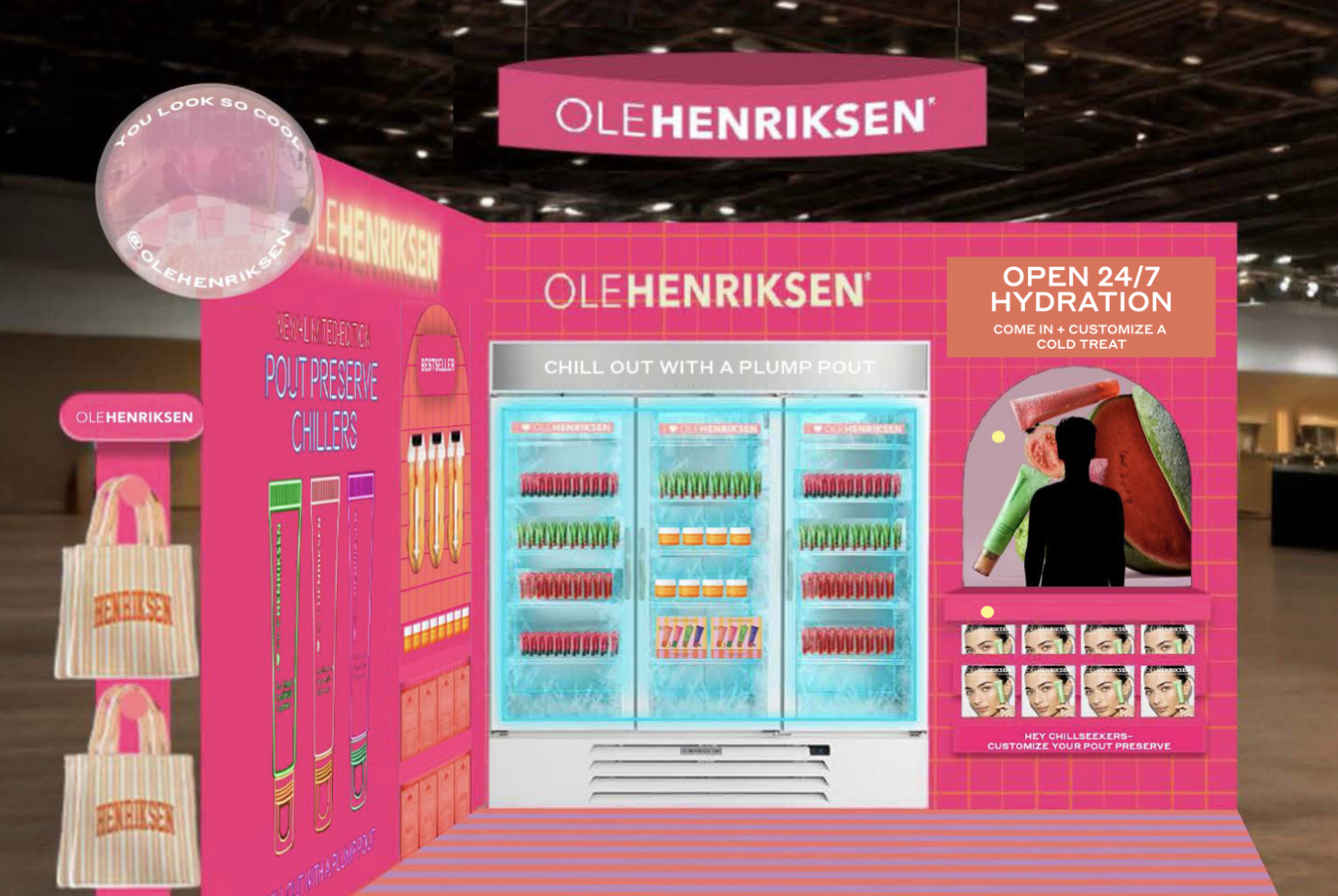 Pink promotional display for Ole Henriksen skincare with a refrigerator showcasing products, promotional posters, and merchandise.