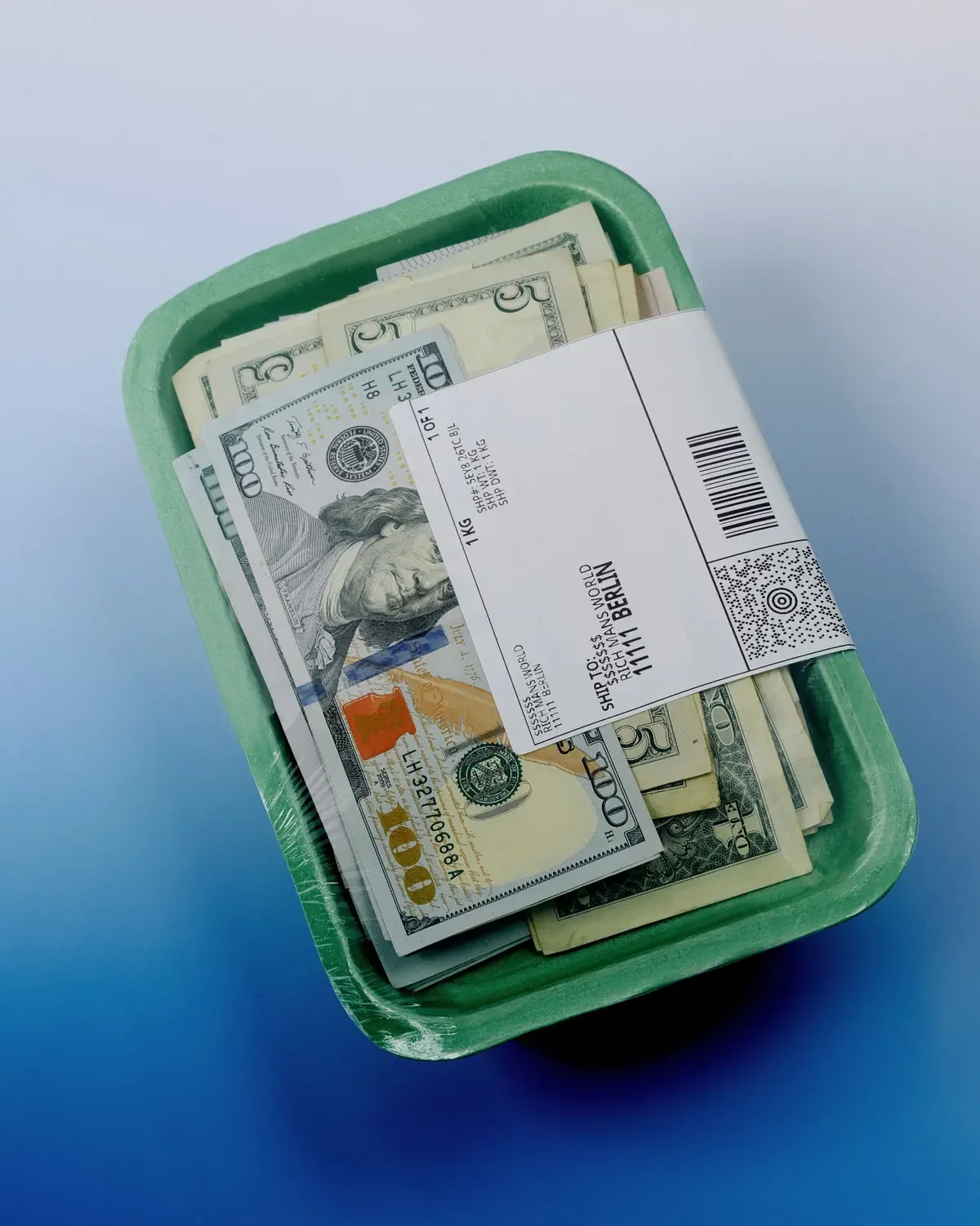 Stack of cash shrink-wrapped in a food tray with a shipping label, illustrating the hidden cost of the ADHD tax.