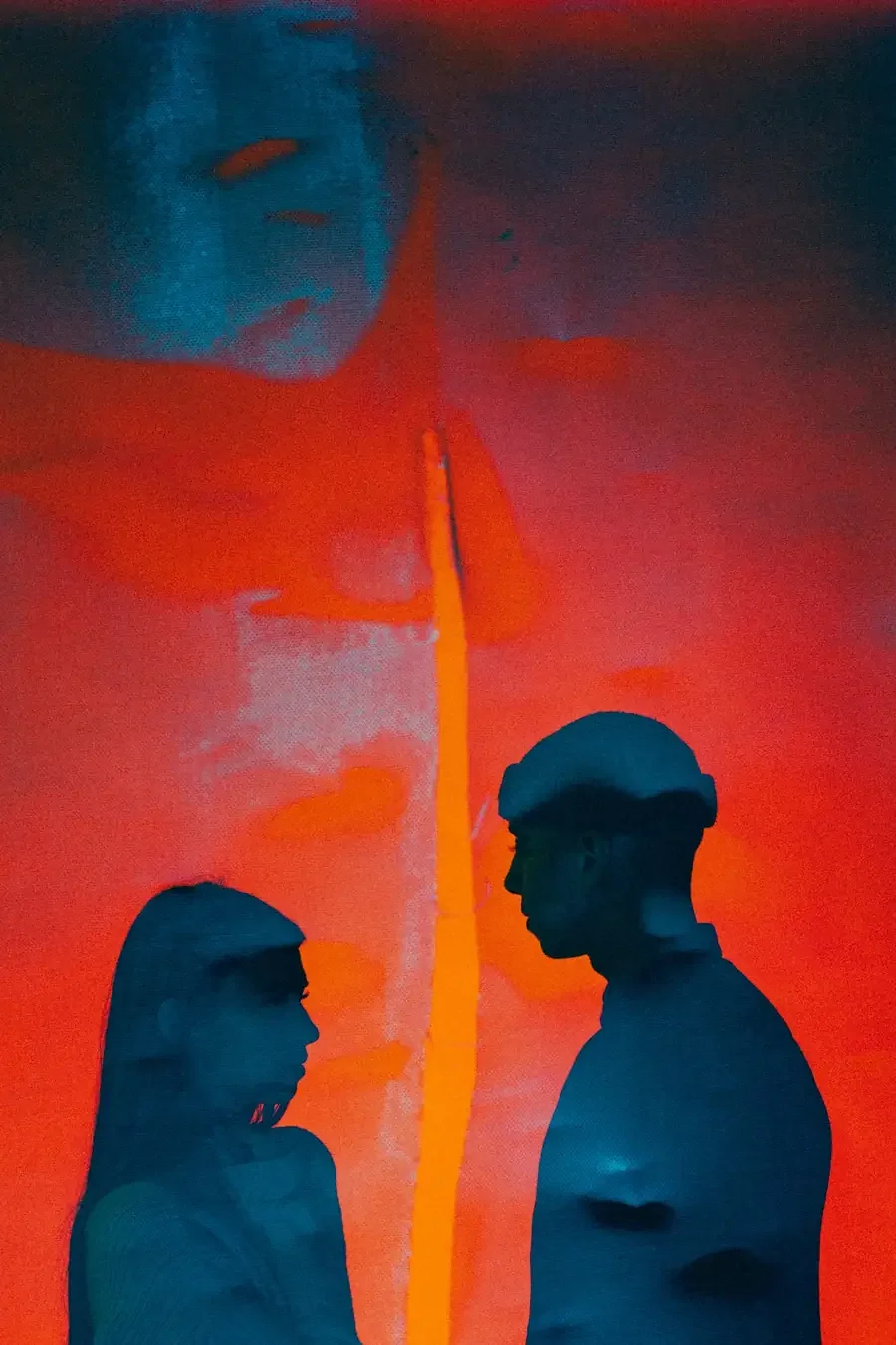 Silhouettes of two people facing each other against a red backdrop, reflecting the standoff demand avoidance can create in adult ADHD relationships