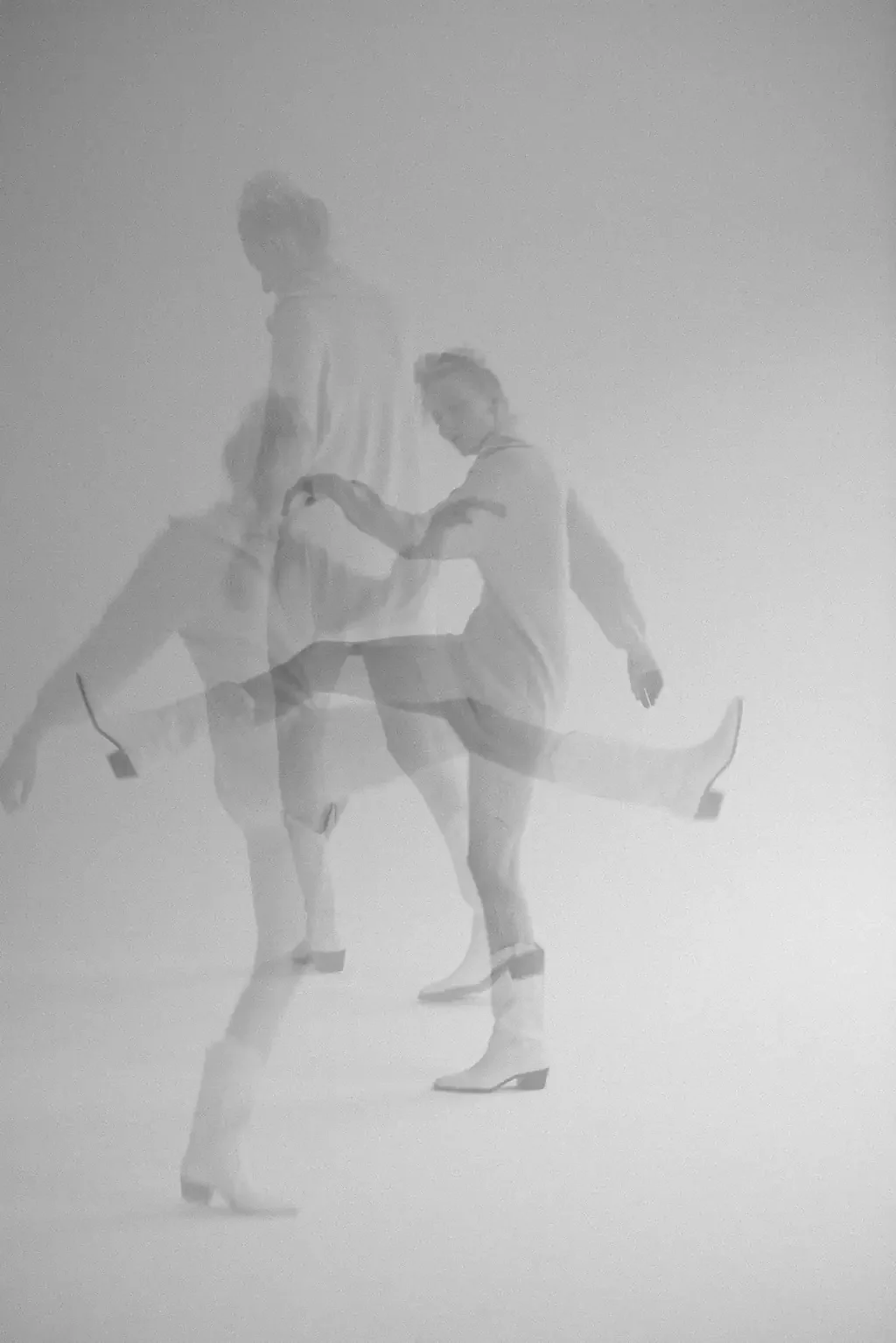 "Blurred multiple exposure of a woman in motion, one leg kicked forward, capturing the restless energy of ADHD and anxiety