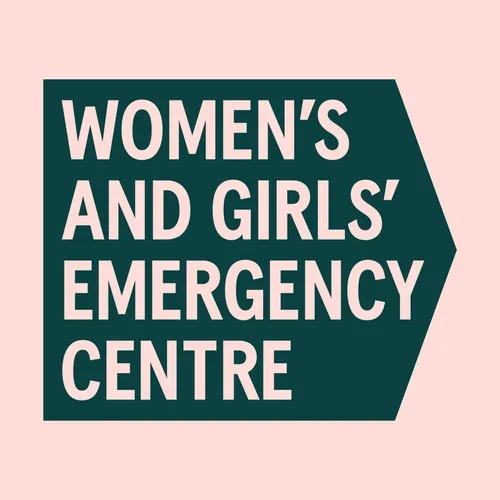 Sign for Women's and Girls' Emergency Centre with pink background