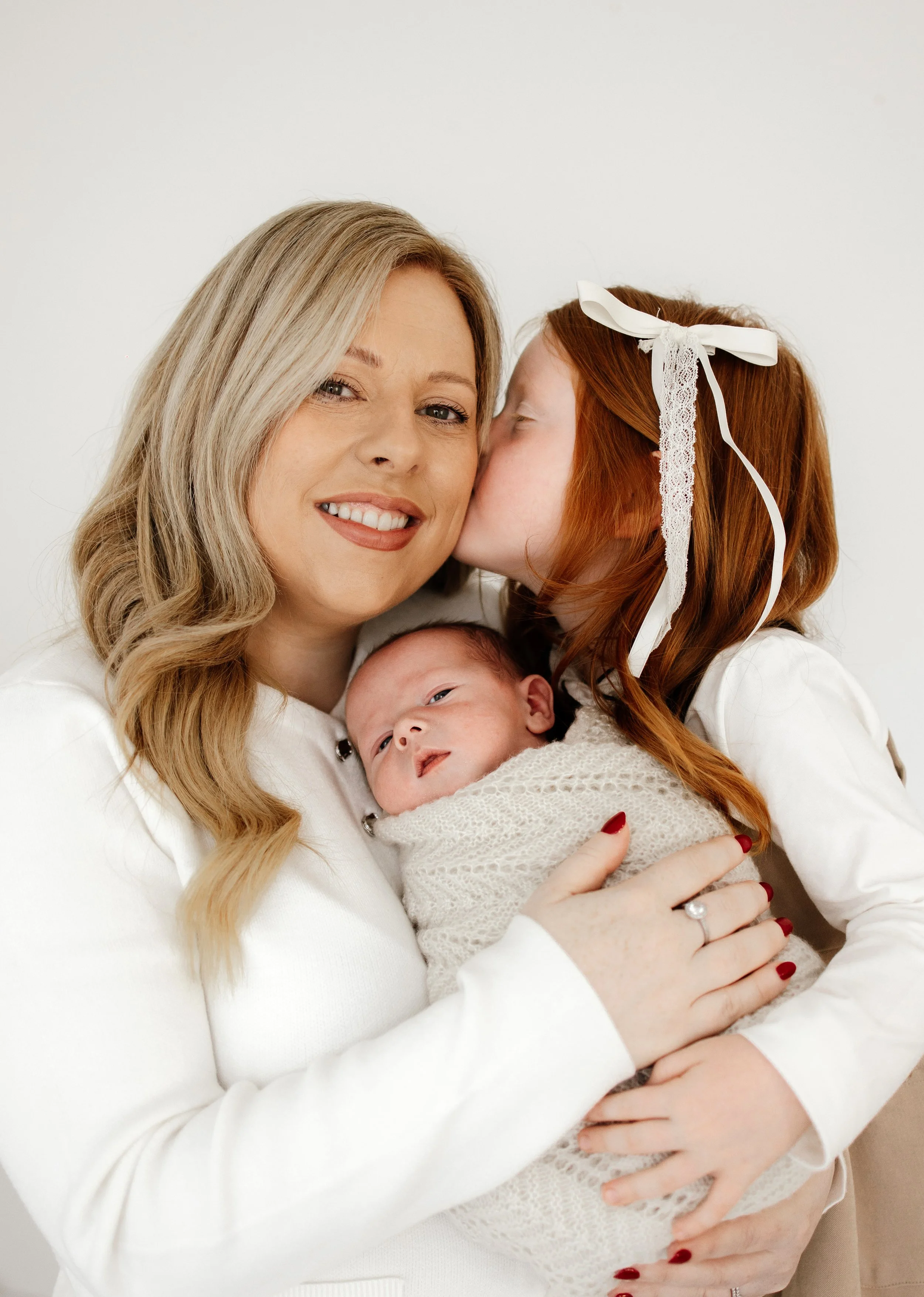 The Magic of Sibling Photos: Including Older Children in Newborn Photoshoots