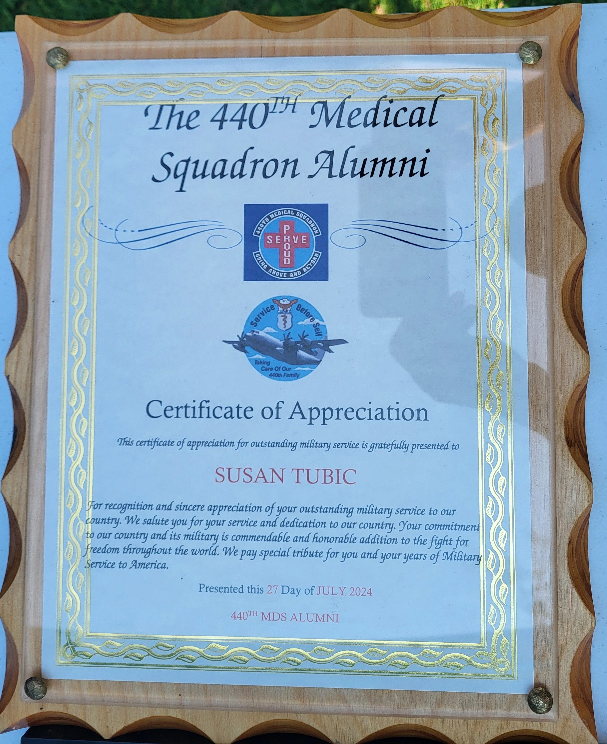 Certificate of Appreciation awarded to Susan Tubic, presented by the 440th Medical Squadron, with military and medical logos.