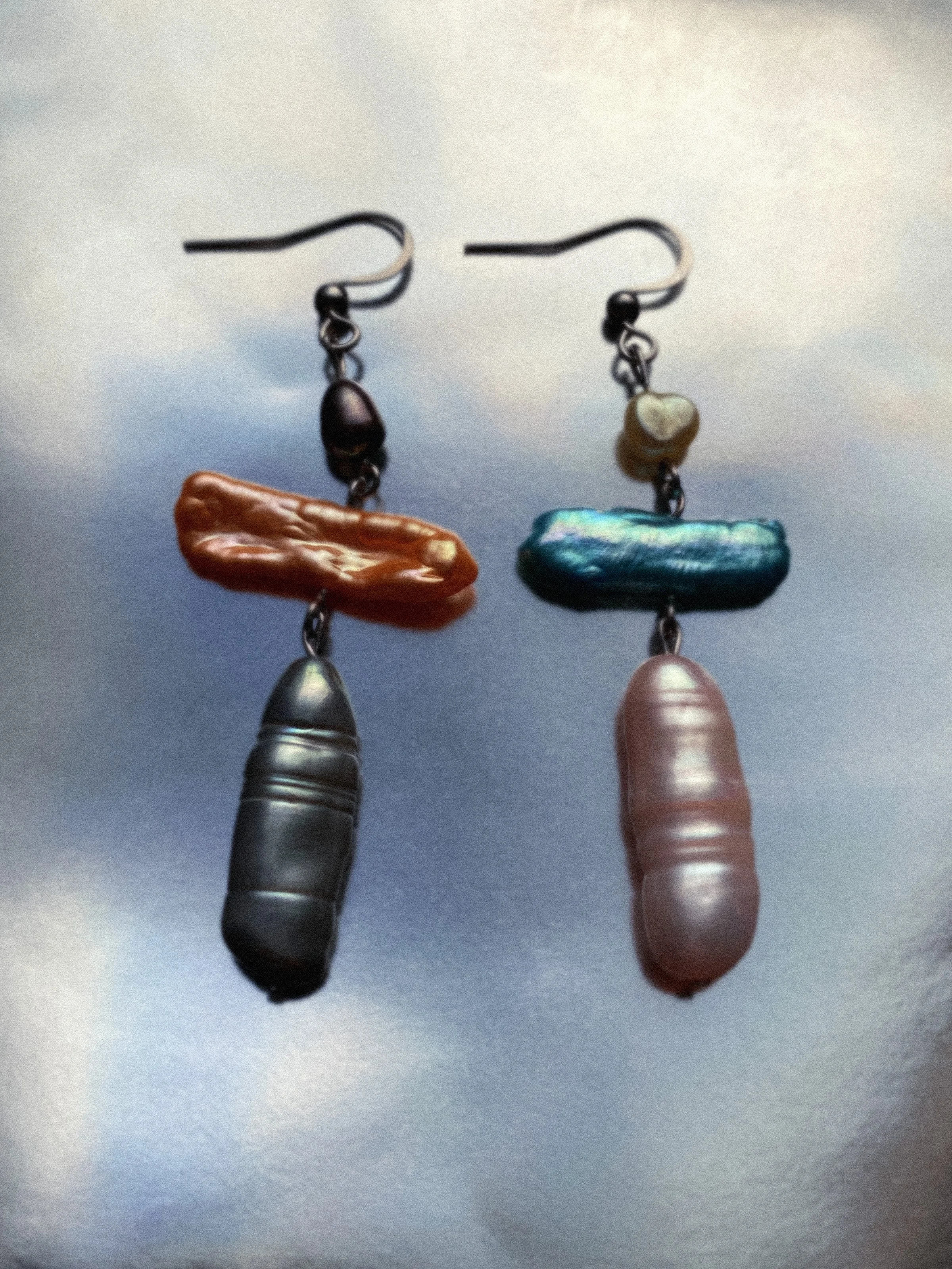 Croix Earrings Ad 2.jpg