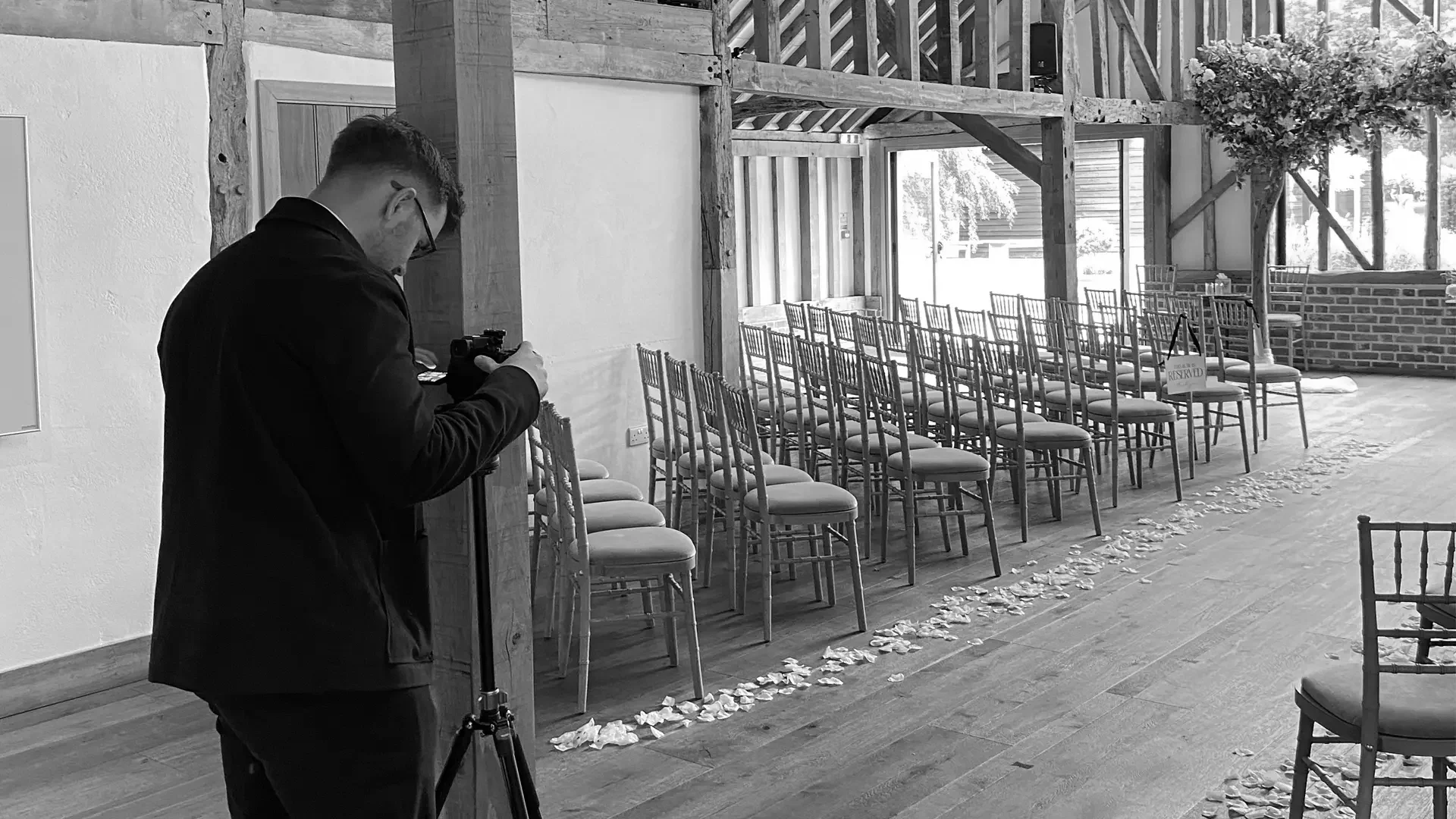 Dominic standing in front of his camera