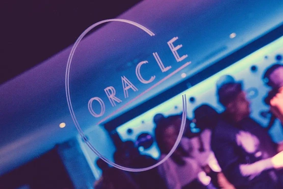 People dancing at the Oracle Bar in Leeds